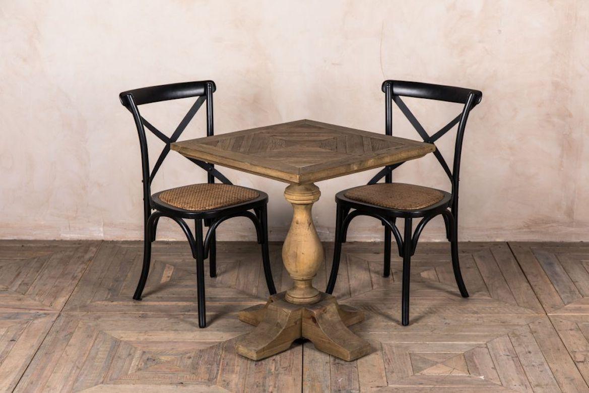 A fine pedestal base cafe table, 20th century. 

This fantastic pedestal base cafe table is new to our wide range of bar and restaurant furniture.

These 70 x 70cm square top tables are crafted from reclaimed oak and elm, and have a lovely