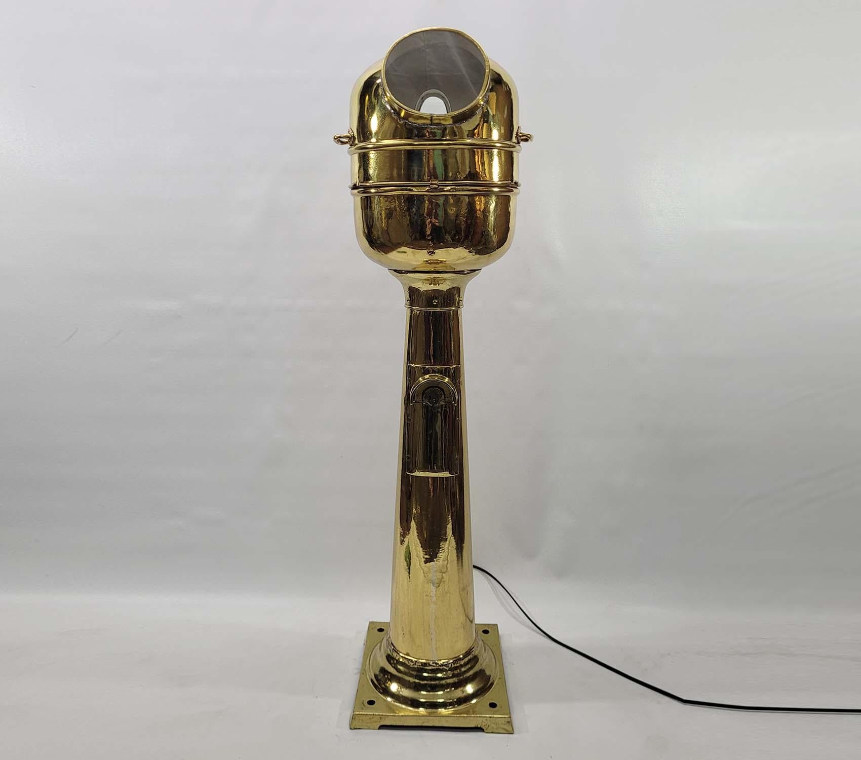 Ships Bridge Binnacle by Kelvin Bottomley Baird Limited of Glasgow and London. The entire Binnacle has been meticulously polished and lacquered. The gimballed compass is engraved 0270. The interior has been fitted with warm lighting. Circa