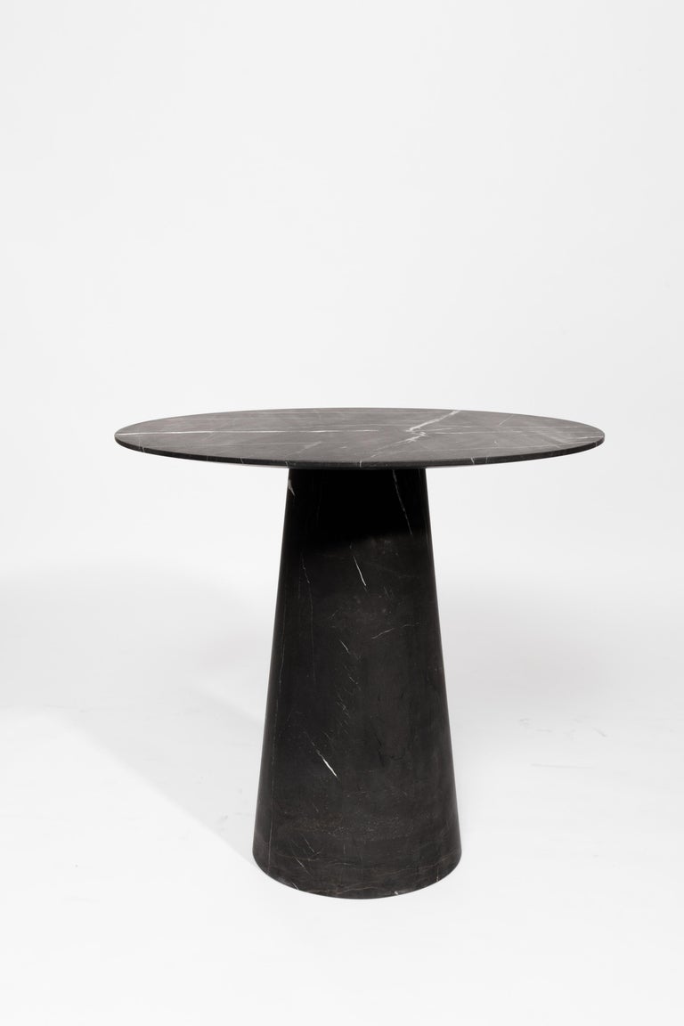 Table in carved Monterrey black marble. Handmade in Mexico.  Production time: 6-8 weeks for items without marble / 13-14 weeks for marble pieces. Shipping +10 additional business days. Casa Quieta uses natural materials such as woods, stones,