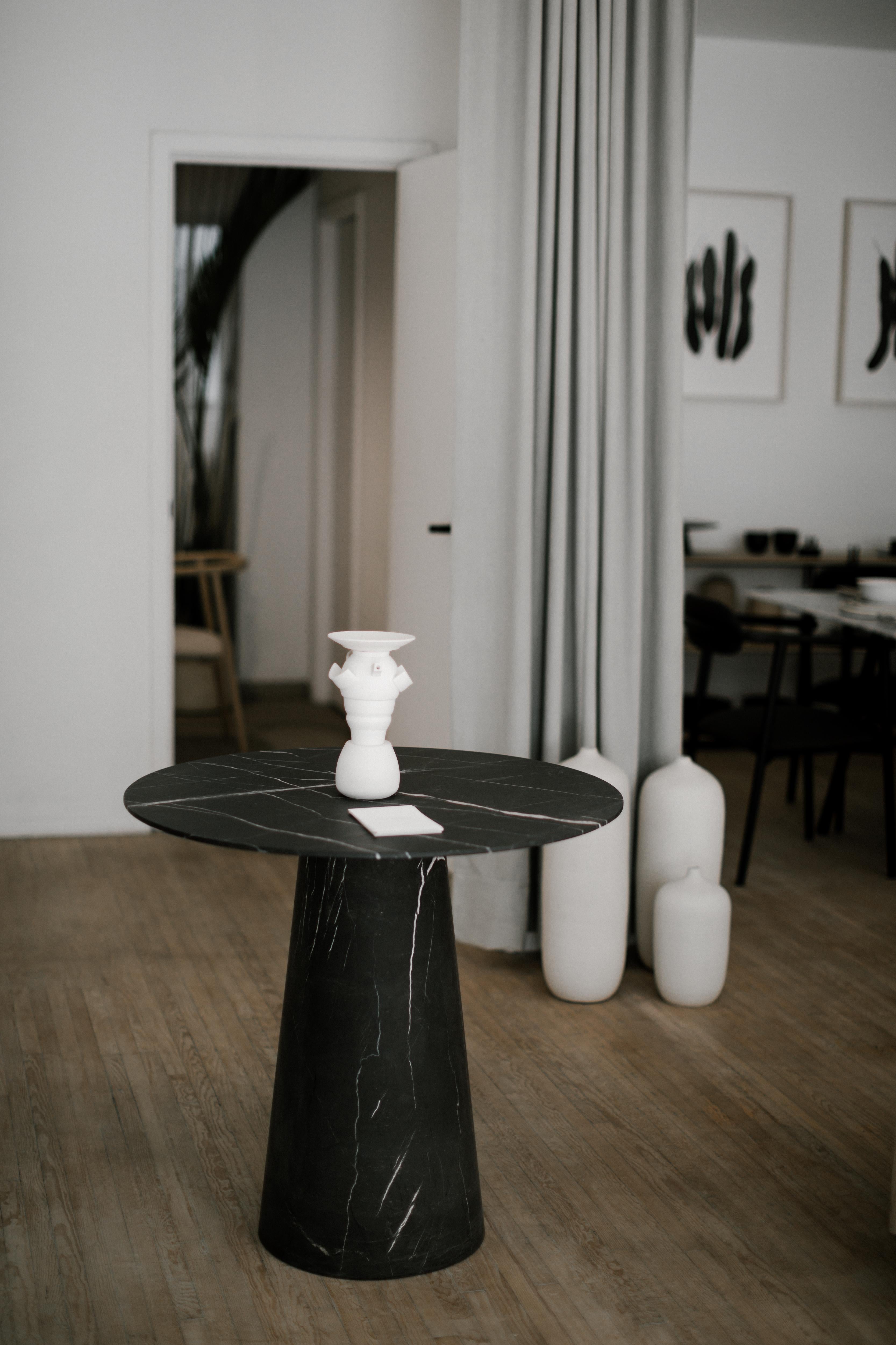 black pedestal table