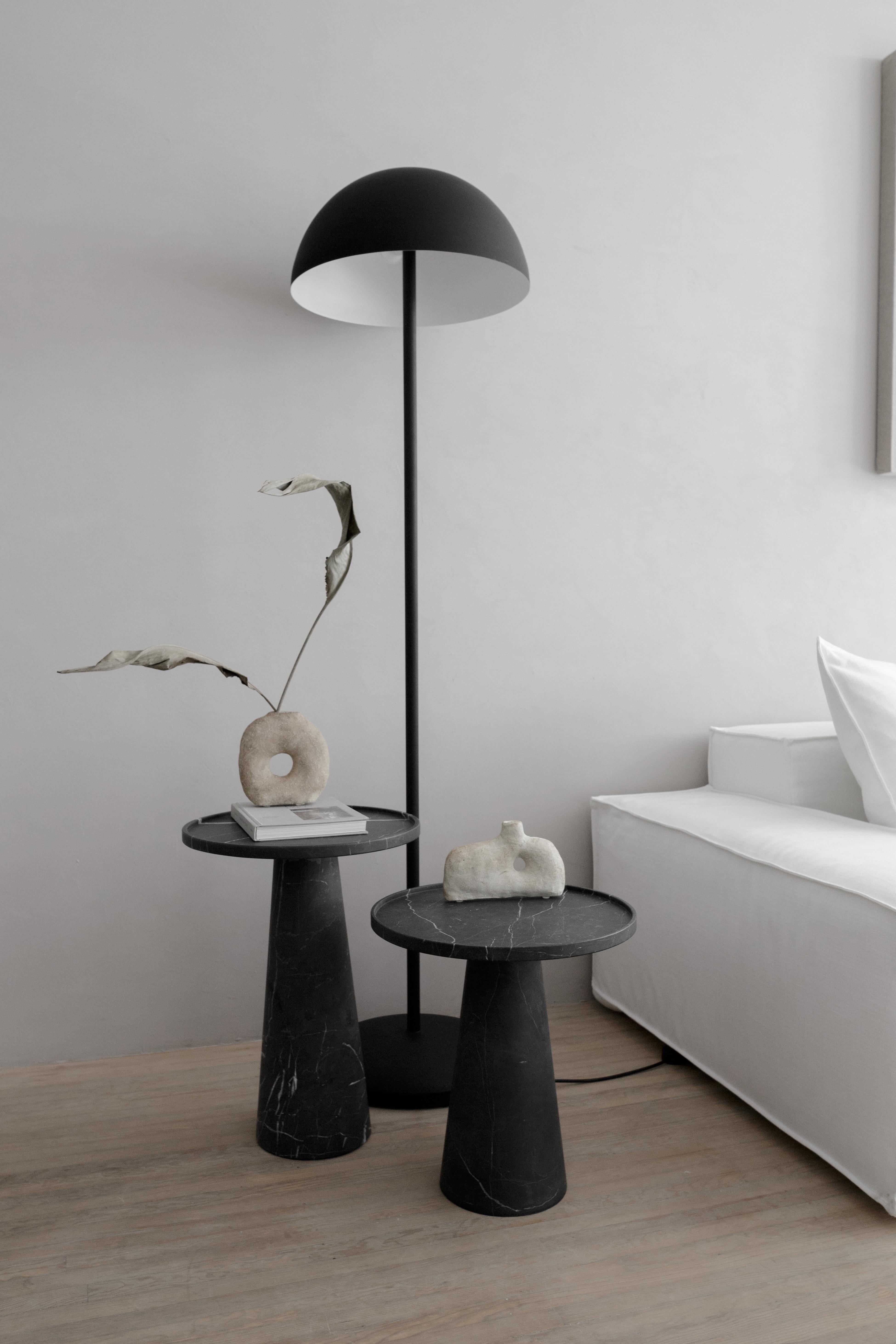 Side table in carved Monterrey black marble. Handmade in Mexico by local craftsmen. For this piece of marble, the cover will arrive disassembled, to install it a screwdriver is essential. Within the delivery, a manual is included to follow the