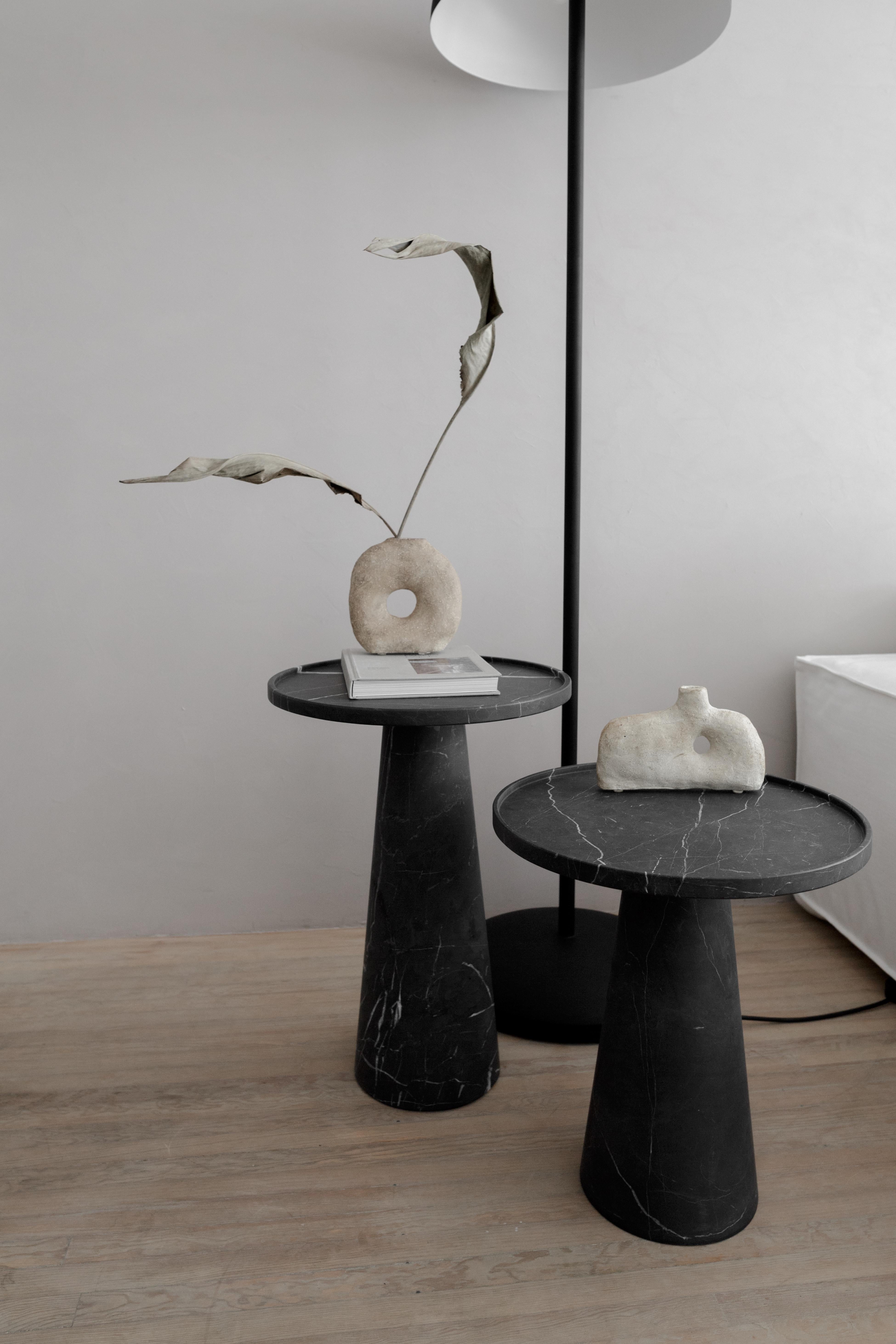 black marble pedestal table