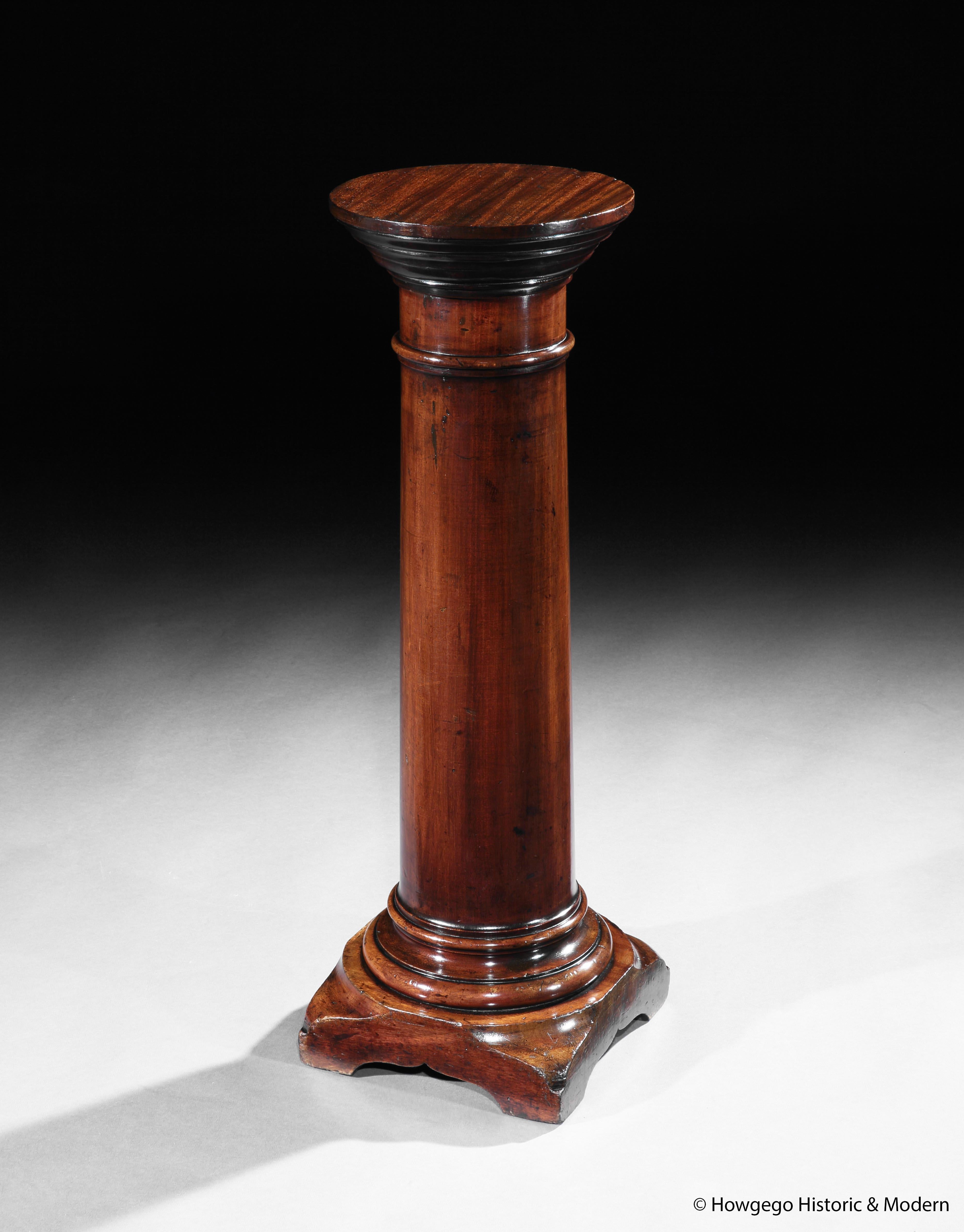 - Classical 19th century, solid Mahogany Roman Tuscan classical column pedestal display stand 
- Unusual low height, 85 cm high, perfect for a lamp or displaying a scultpture or ceramics
- The circular top with lovely straight grain figuring. 
 -