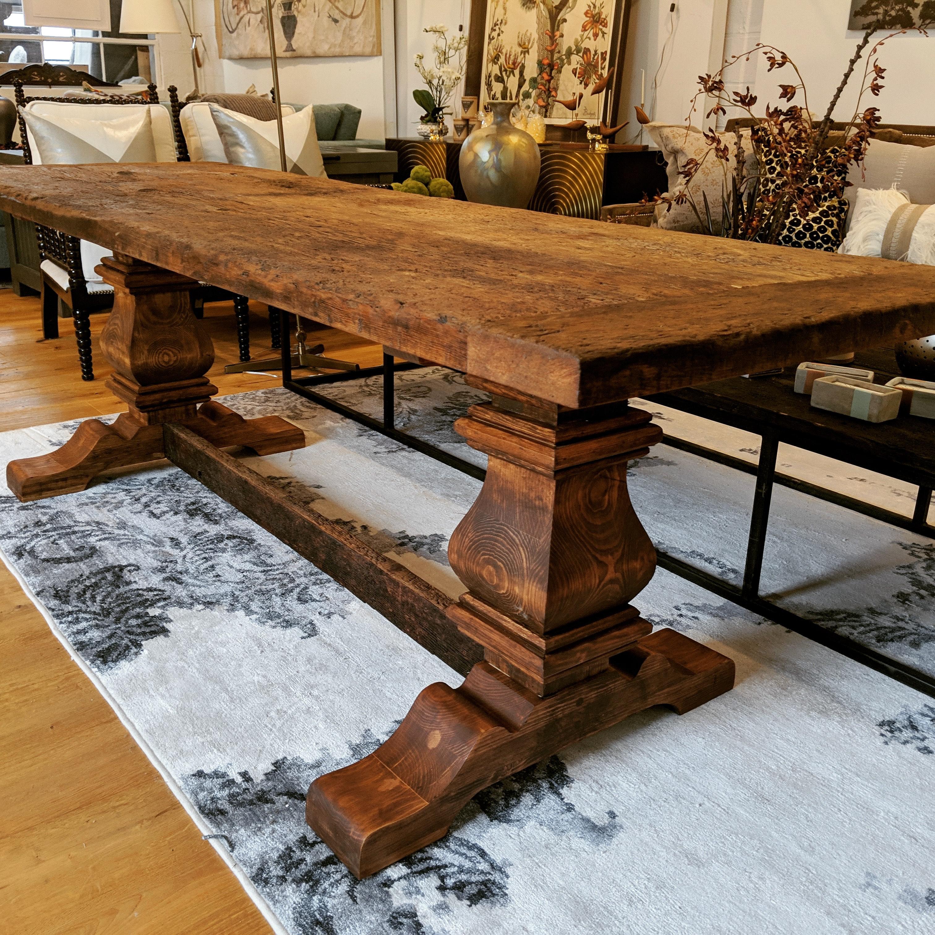 This pedestal dinning/library table utilizes reclaimed lumber from the barns of Pennsylvania's Mennonite community, harvested and re-purposed. The lumber was cut by hand from Old Growth forests in the 16th century. It was specifically cut for the