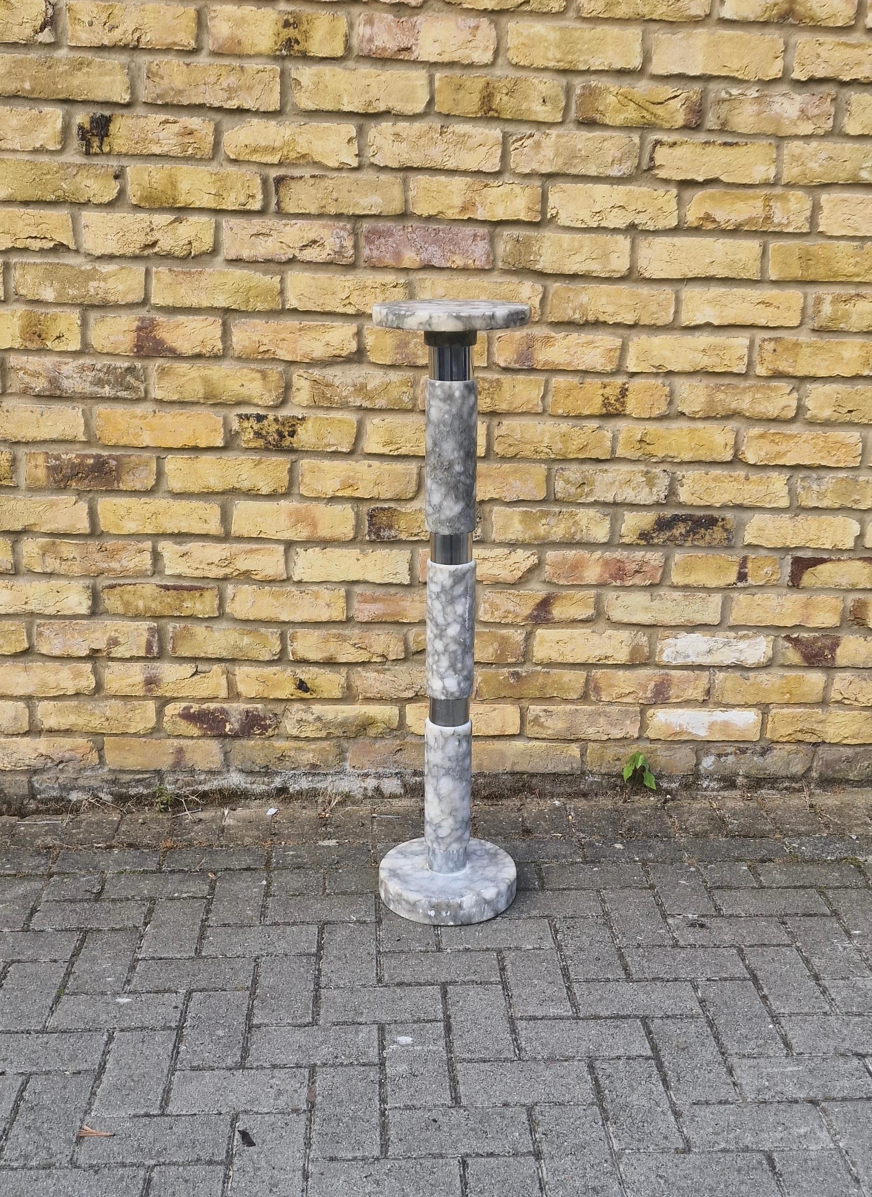 Very unusual marble and chrome column 
Ideal for display wear is consistent with age.