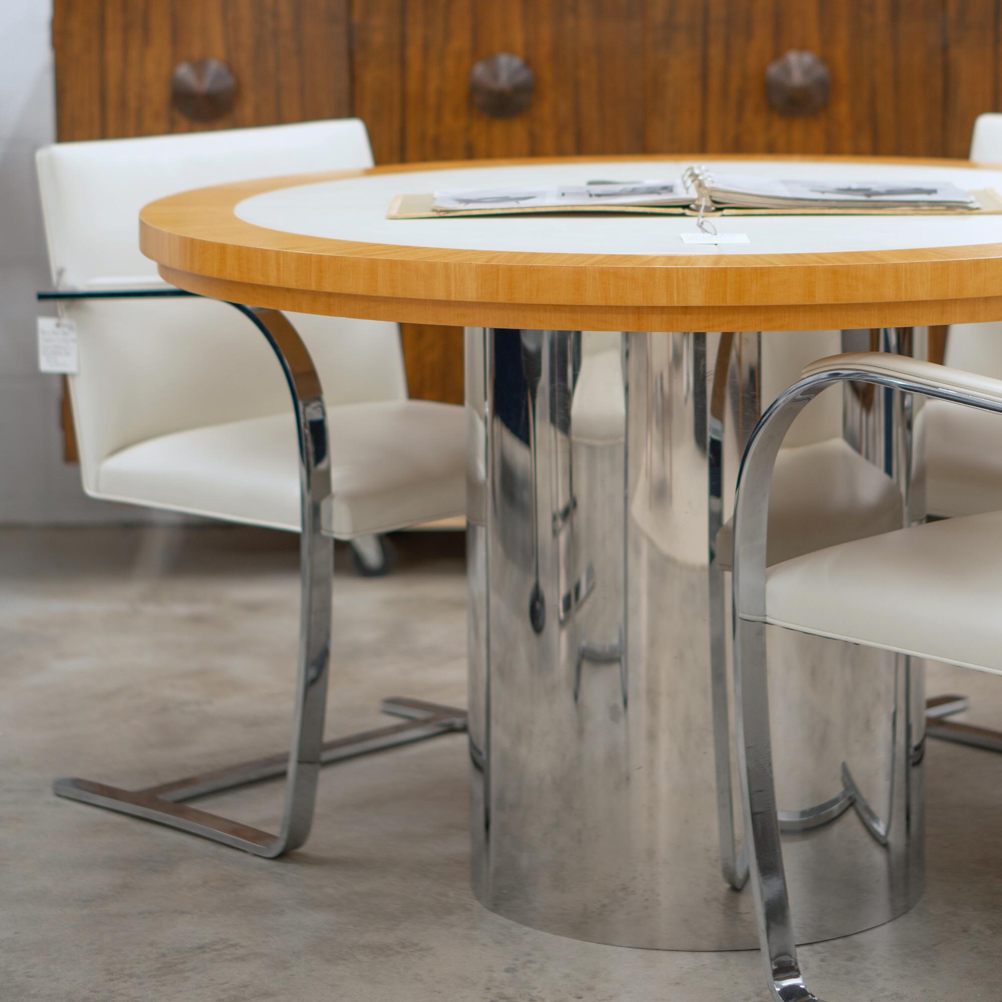 Material synergy was an idea commonly experimented with in the Mid-Century and remains popular in contemporary design. The shown table is a newly fabricated custom piece, designed specifically to accommodate a Set of 4 Knoll Brno Flat-Bar Chairs in