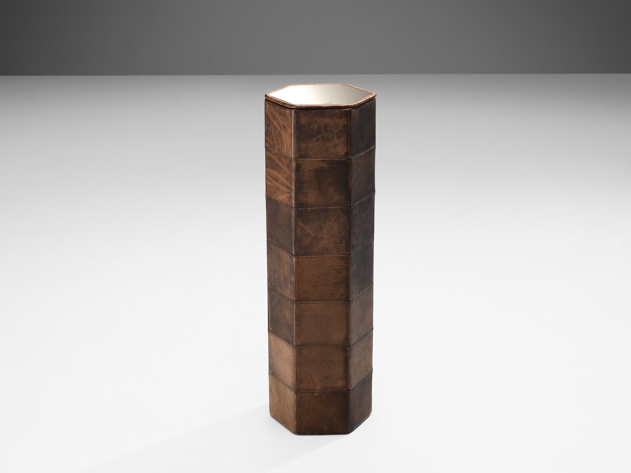 Column or side table, leather, mirror, Europe, 1980s

Decorative column made in patchwork leather and mirrored top. This piece was made in Europe in the 1980s, and shows post modern characteristics. The leather used to wrap the column is in brown
