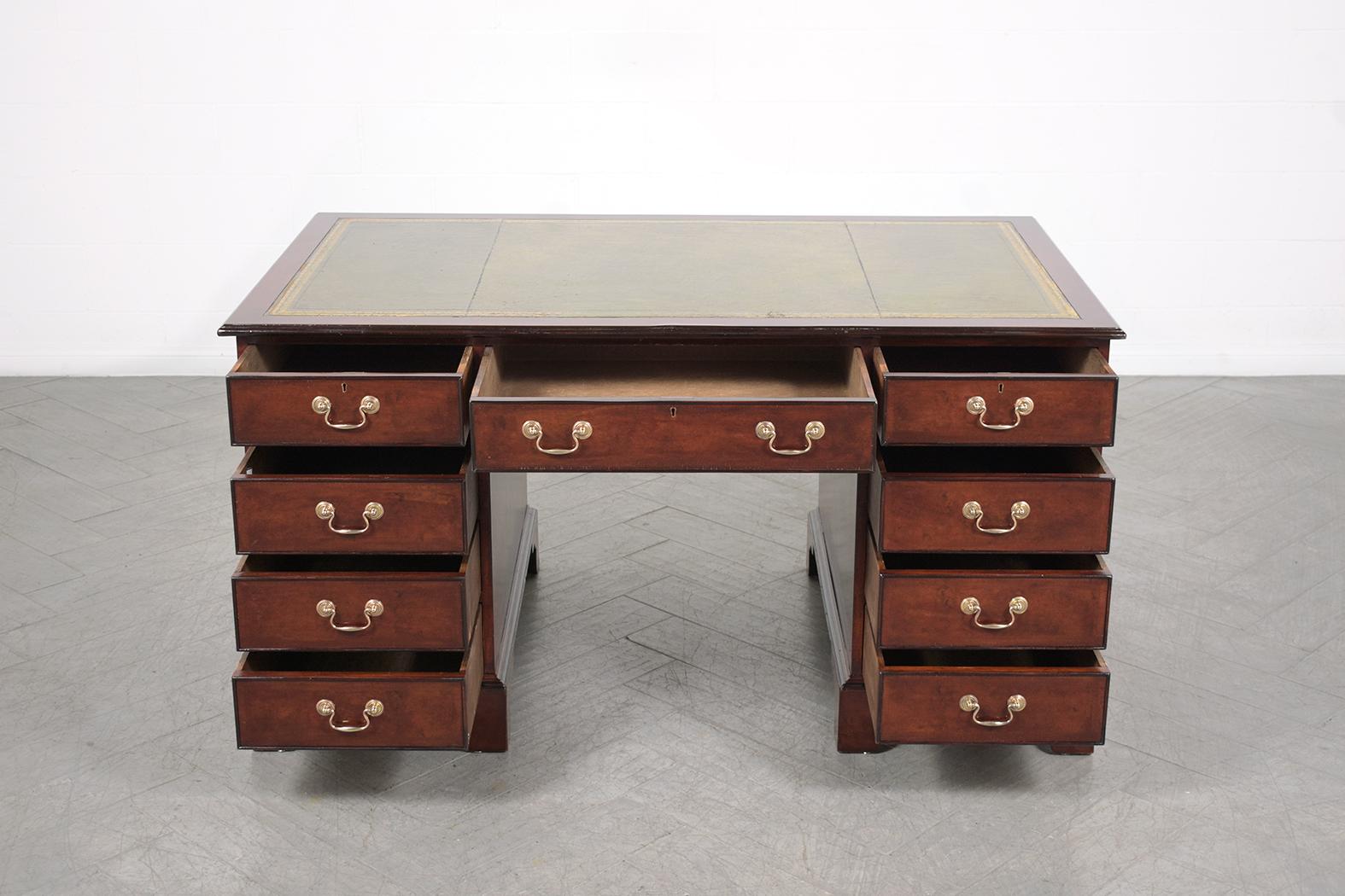 Dive into the bygone era of regal elegance with our magnificently restored George III vintage partner desk from the 1950s. Each detail of this desk resonates with the charm of time-honored craftsmanship. Masterfully curated by our skilled experts,