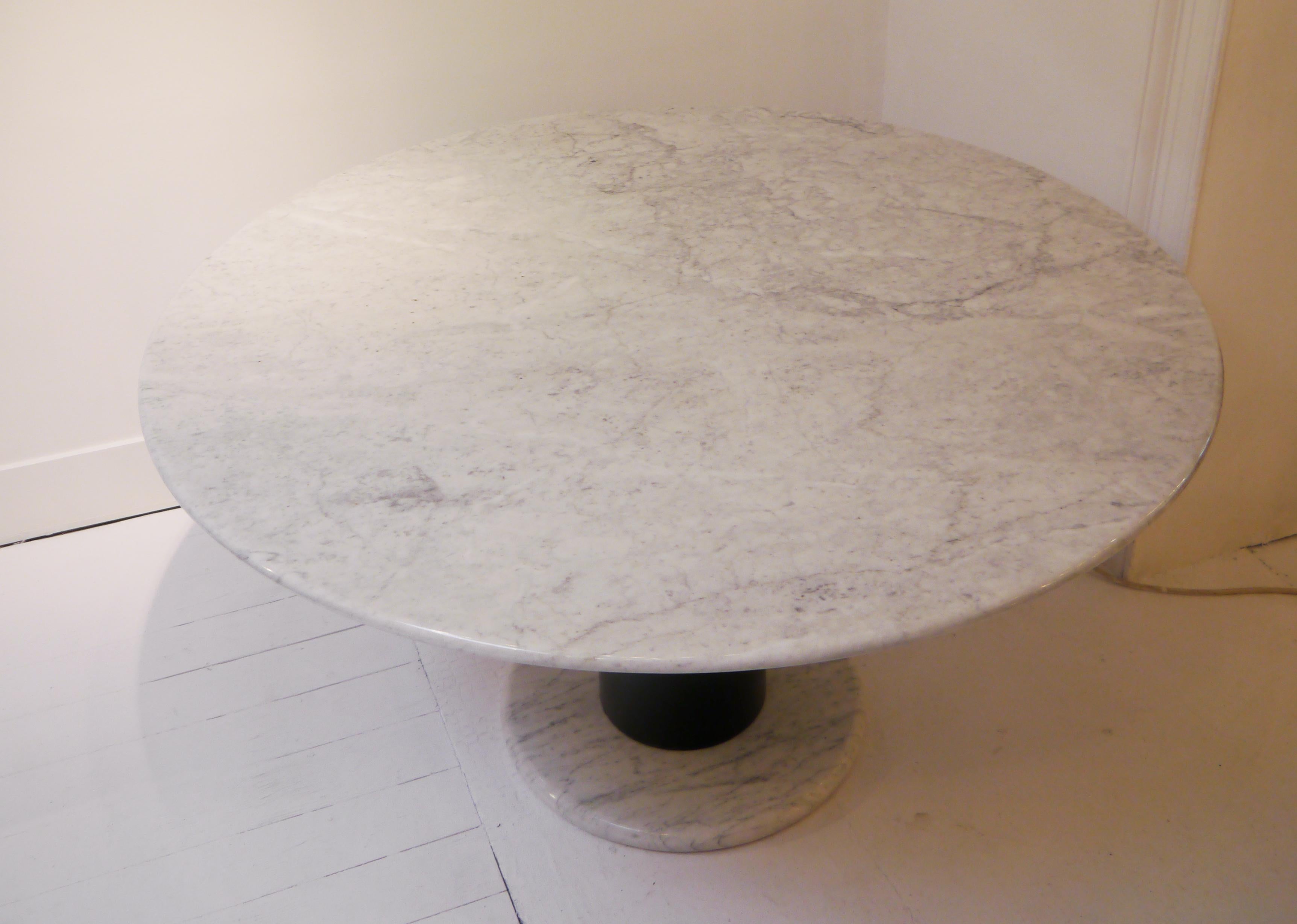 Pedestal table in Carrara marble table by Ettore Sottsass.