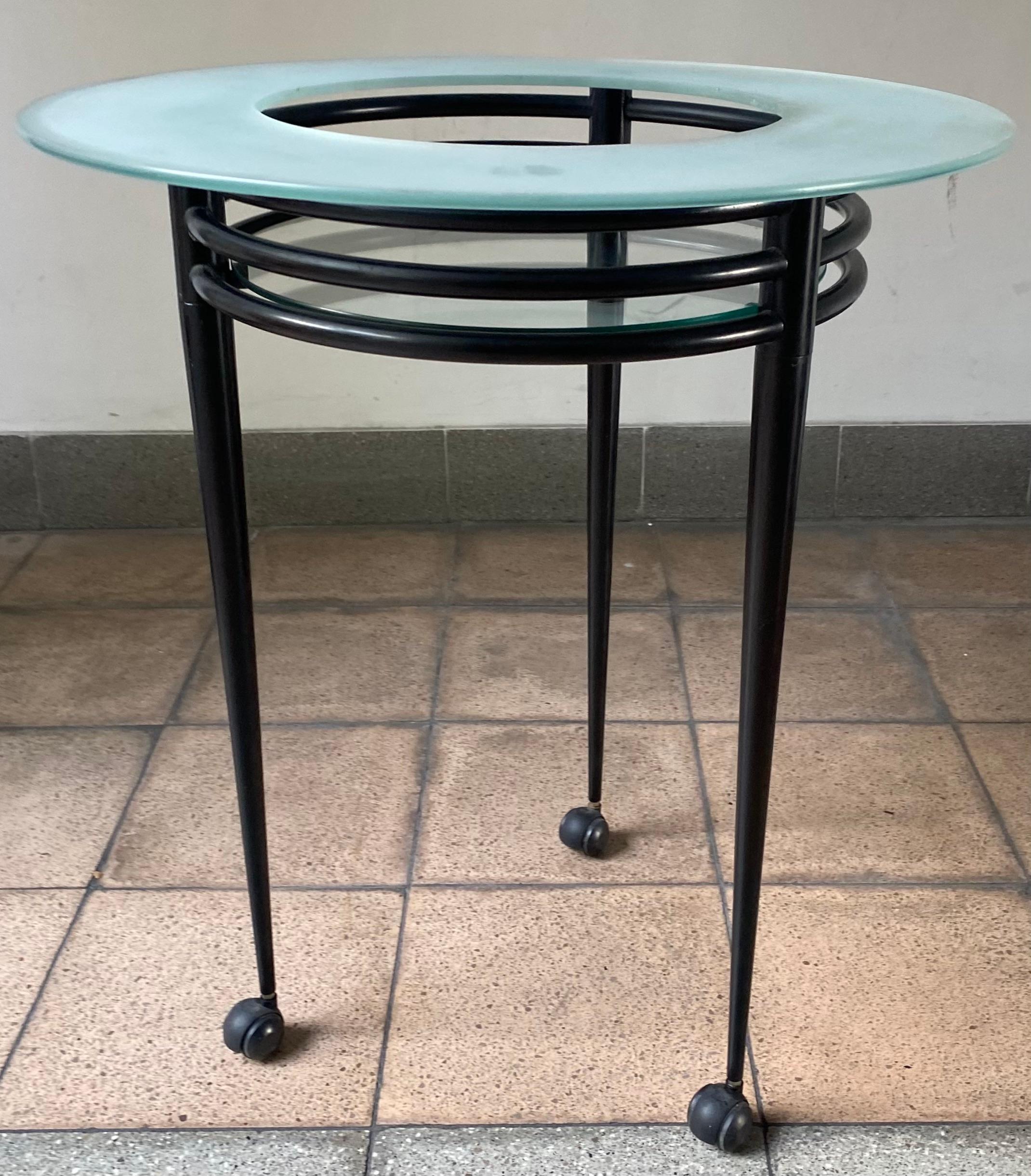 Pedestal table on wheels by Pascal Mourgue.
Artelano edition. 
Sandblasted glass top and steel legs.
Model luna atlantique. 
Measures: Ø 65 cm x H 76 cm. 

A graduate of the Ecole Boulle, Mourgue is more than just a great designer who has
