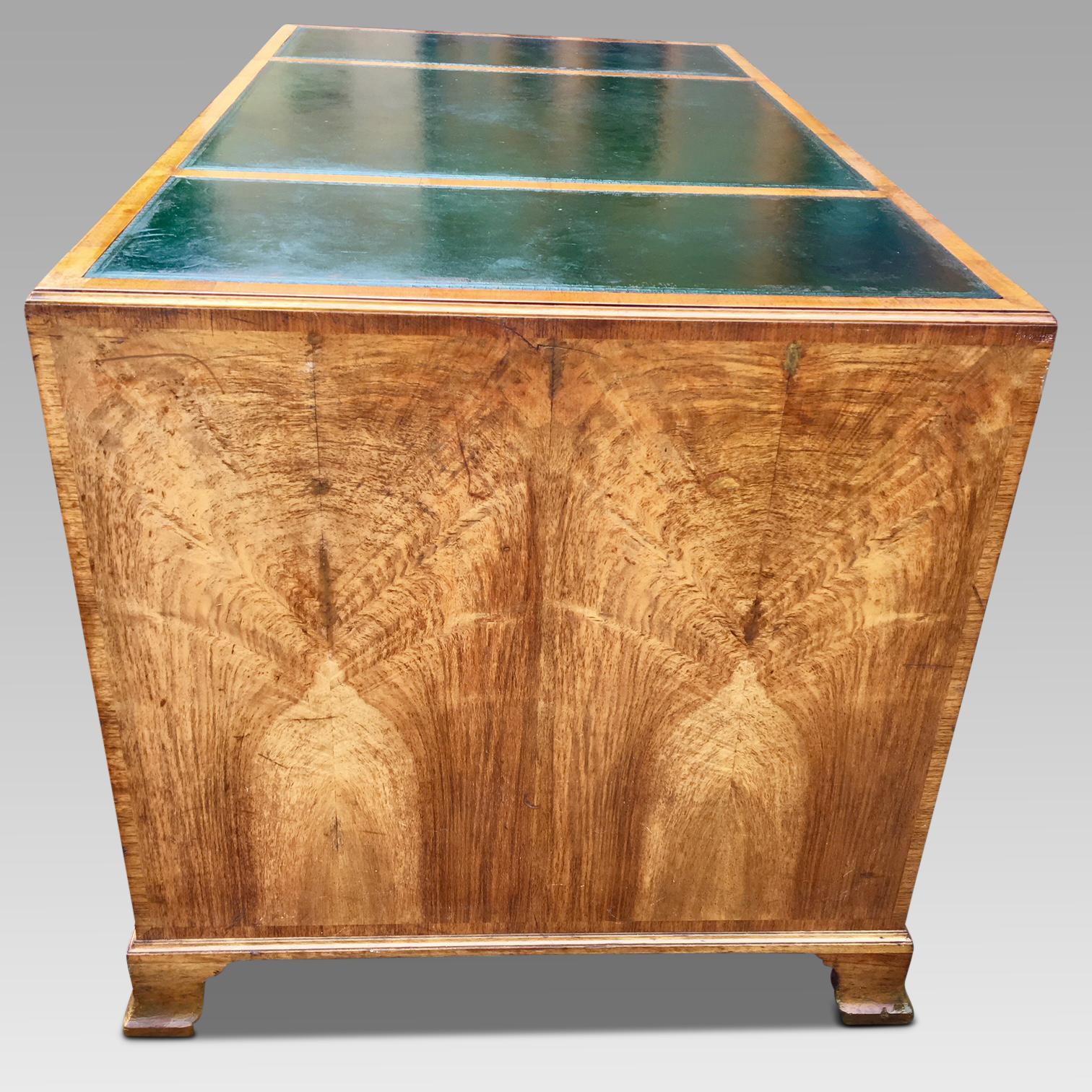 Heal's walnut pedestal desk, circa 1930s. 

An attractive one part pedestal desk, ideal for the current trend of lighter and less
busy antique furniture. Superbly made and  a pleasure to admire 

This walnut desk is in virtually original condition,