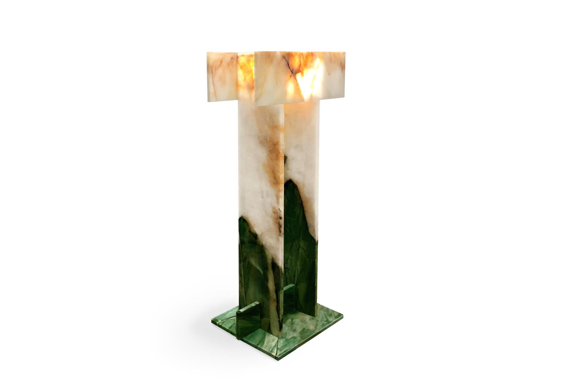 This is Pedrita floor lamp (Model S) and it is part of Pedrita lamp series.
This floor lamp is made of a rare quartzite of unique geological formation. 

Pedrita lamp series’ concept is based on an experimentation of Brazilian stones: quartzites and