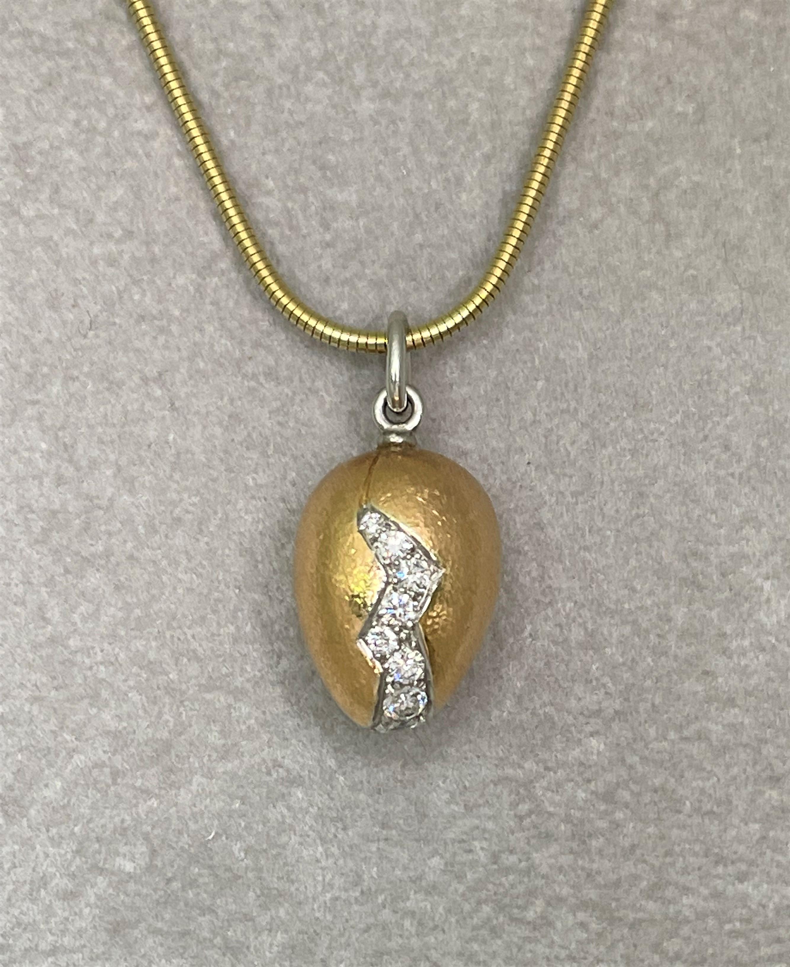 By designer Pedro Boregaard in New York, this pendant is egg-ceptional!  
18 karat yellow brushed gold egg; approximately 11mm wide and 21mm long.
Designed 