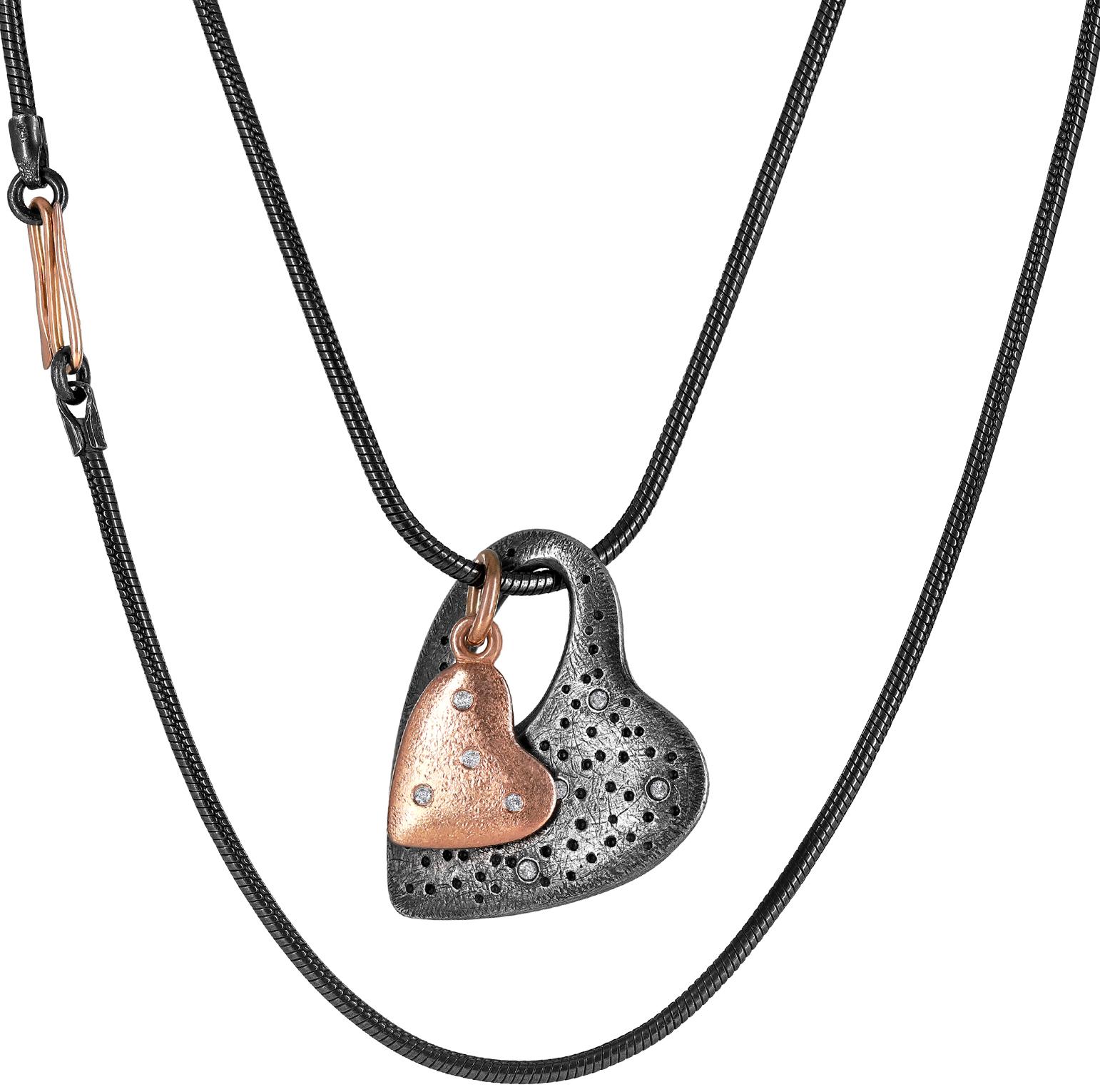 Double Diamond Dust Heart Long Pendant Necklace hand-fabricated by renowned jewelry maker Pedro Boregaard featuring an 18k rose gold heart and an oxidized sterling silver heart, each embedded with round brilliant-cut white diamonds on both side (18