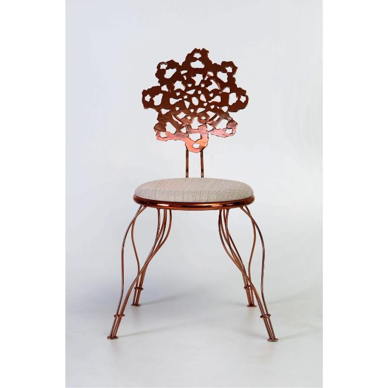 The collection of Fla chairs created by designer Pedro Franco is a high quality piece of art design by A LOT OF Brasil. Inspired by Brazilian lace, it has a steel structure, a backrest in the form of laser-cut authorial lace, with a copper finish