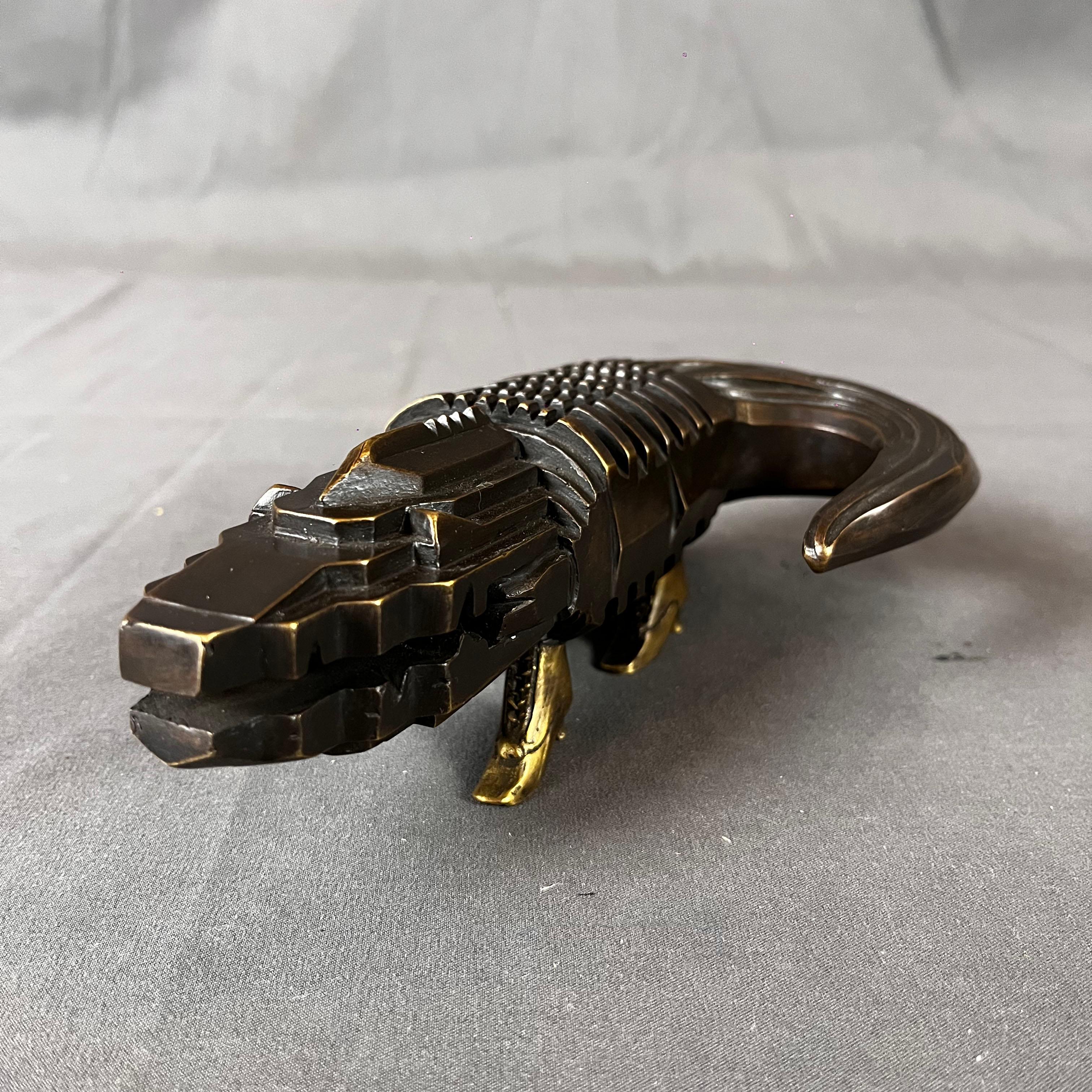 Black crocodile wearing golden heels by Italian - born Mexican artist Pedro Friedeberg. The sculpture is series 6 / 10. Signed PEDRO FRIEDEBERG under the body, Limited 10-pieces edition. A certificate signed by the artist will be included with the