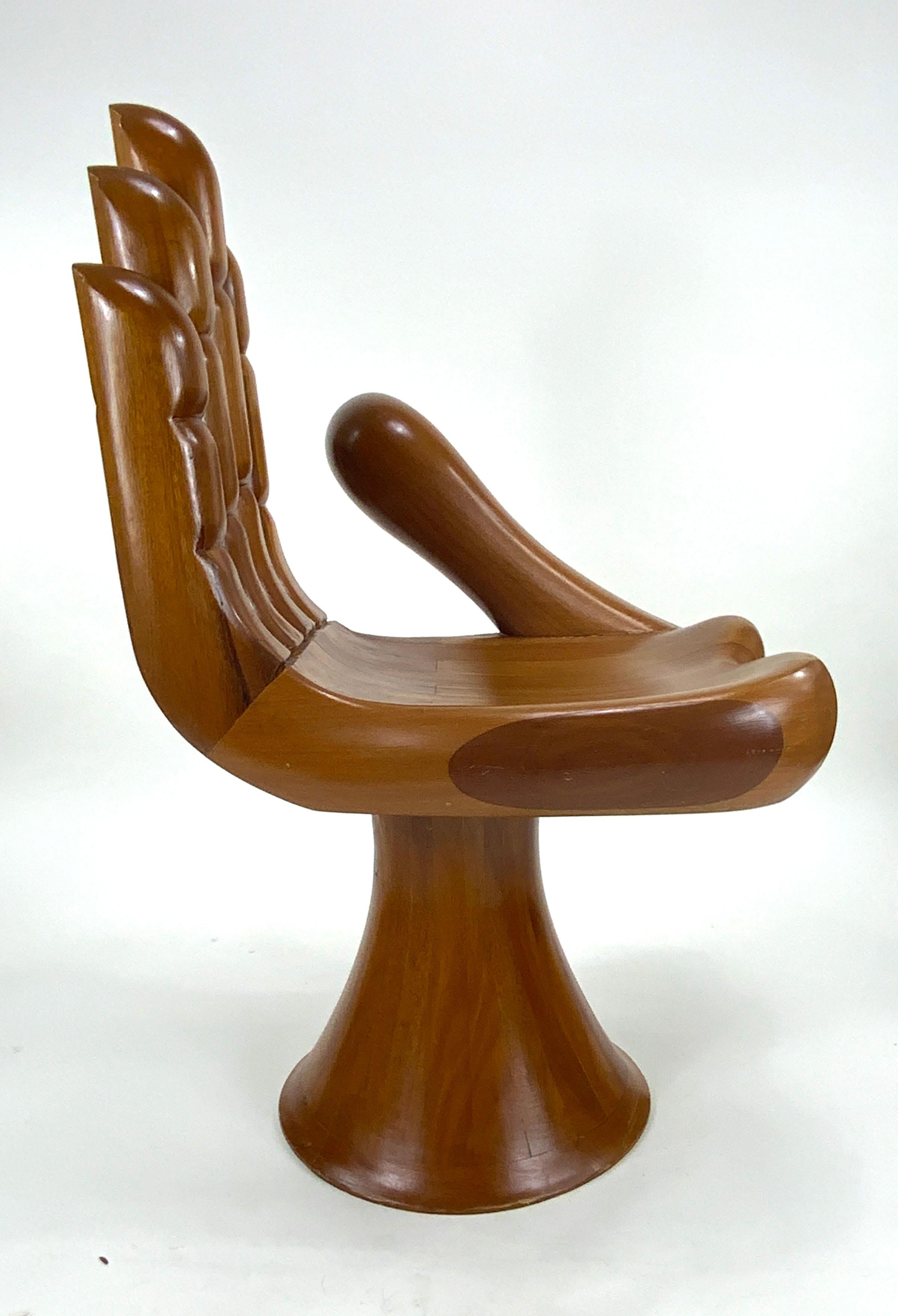Pedro Friedeberg (Mexican, b. January 11, 1936) is an Italian-born Mexican artist and designer known for his surrealist work.  His best known piece is the  “Hand Chair”, a sculptural chair designed for people to sit on the palm, using the fingers as