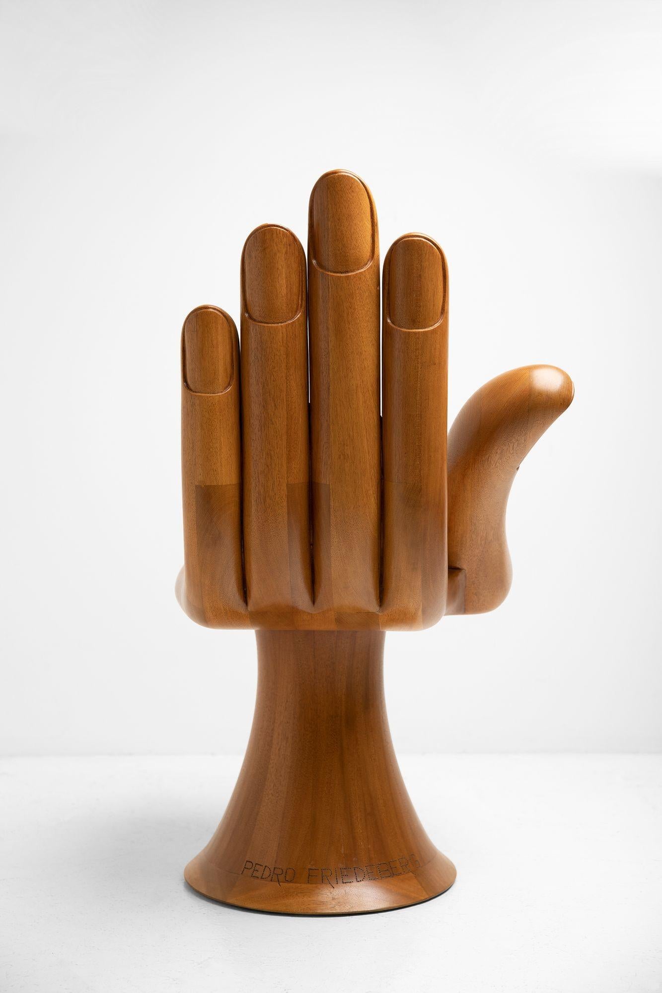 wooden hand chair with fingers