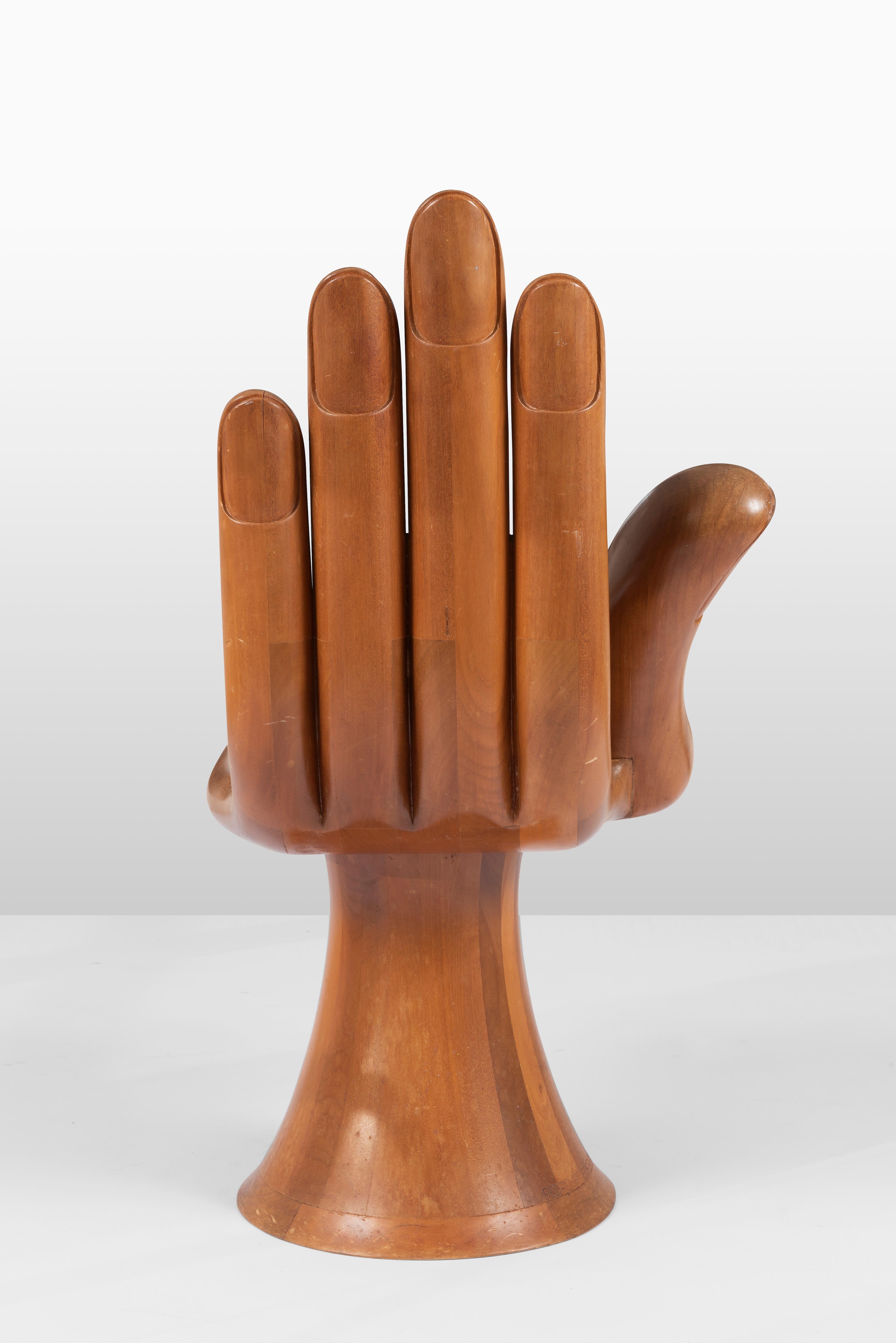 wooden hand chair with fingers