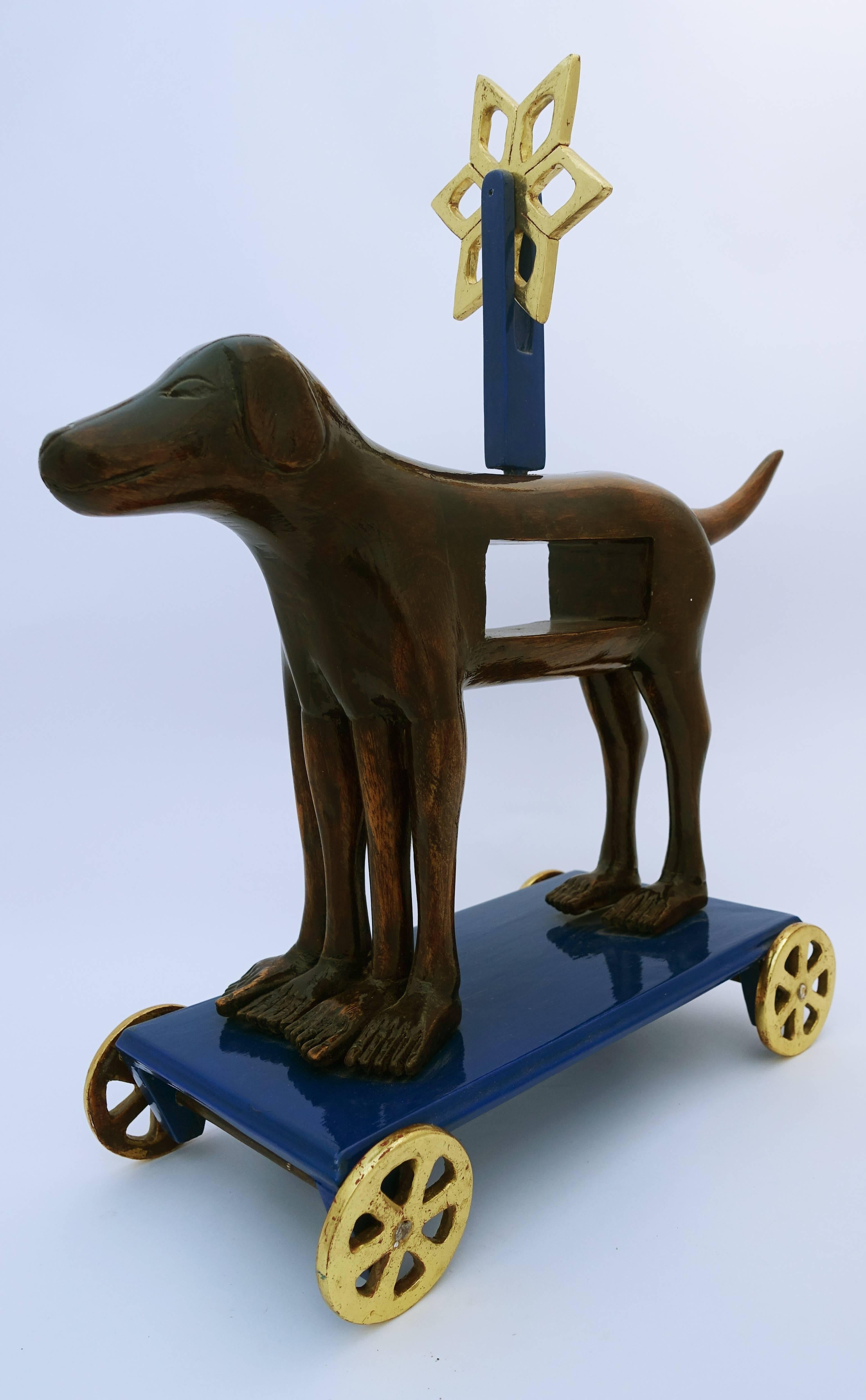 Hunde auf Rädern mit Windmühle (Surrealismus), Sculpture, von Pedro Friedeberg