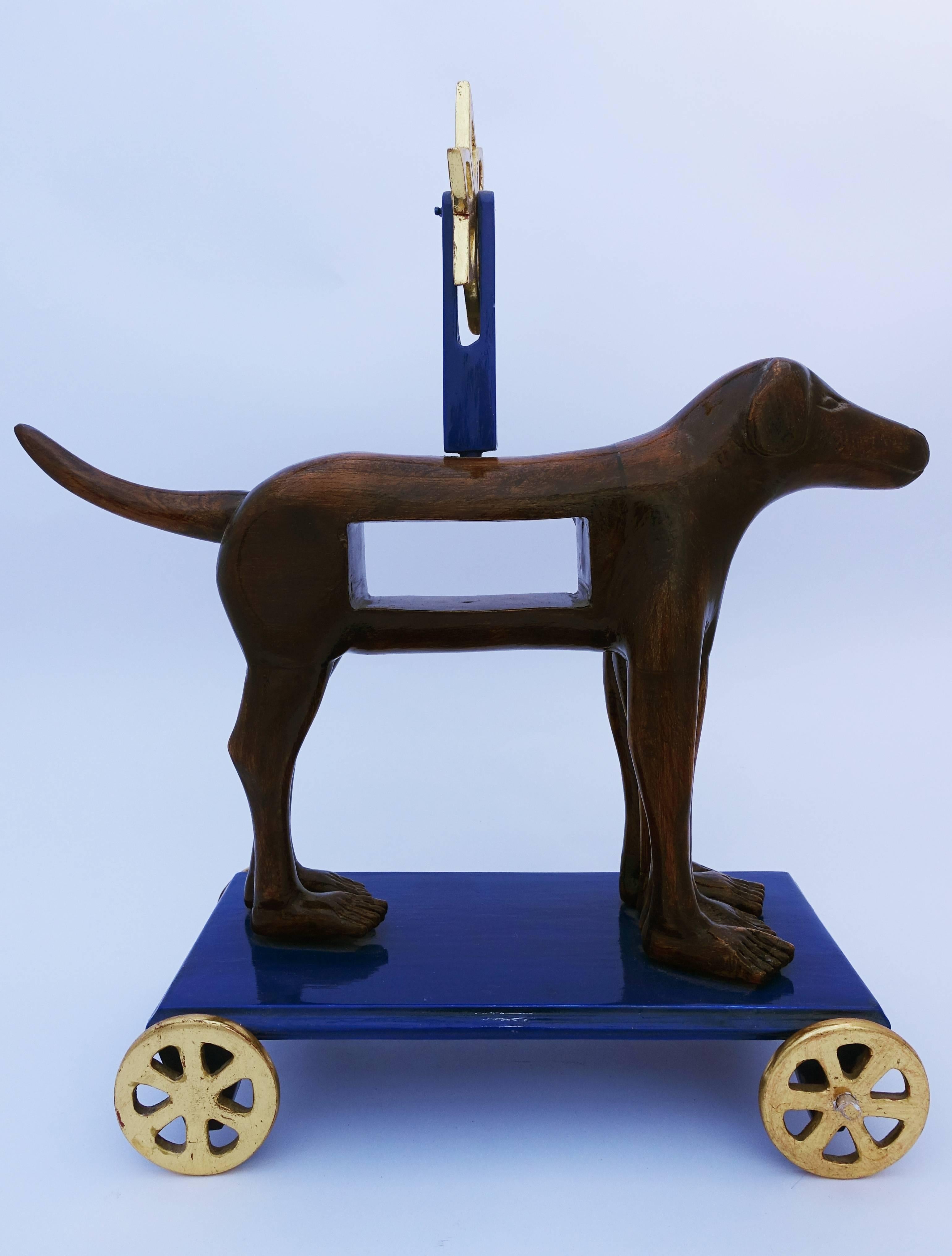 Pedro Friedeberg Figurative Sculpture - Dog on Wheels with Windmill