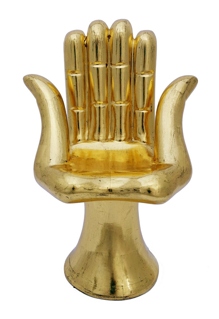 hand sculpture with two thumbs
