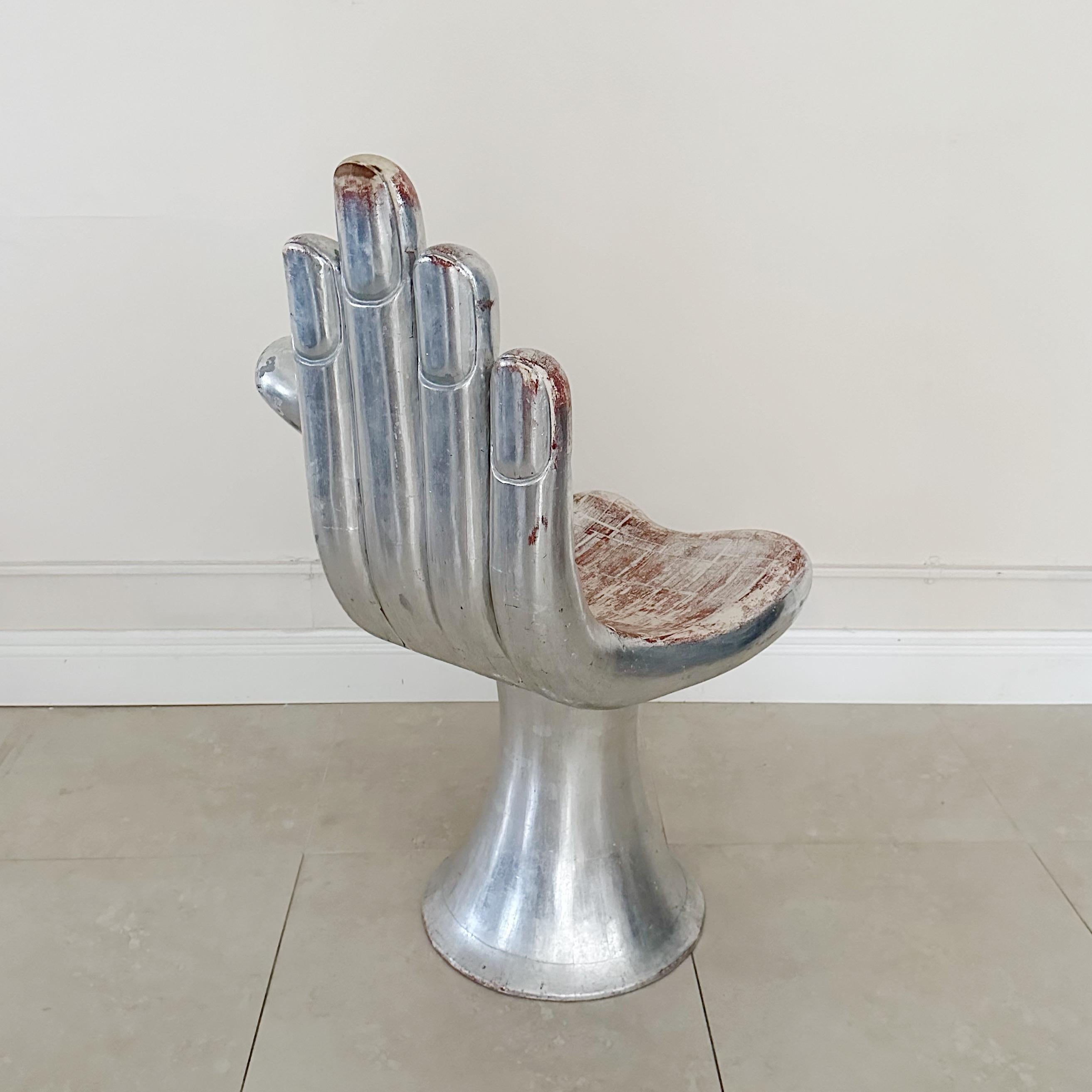 Pedro Friedeberg Silver-Gilt Hand Chair. Circa 1960s Mexico, This chair is an early example of the iconic “hand” chair designed and made by Pedro Friedeberg. The chair is hand-carved from solid mahogany and silver-leafed with a water gilt technique