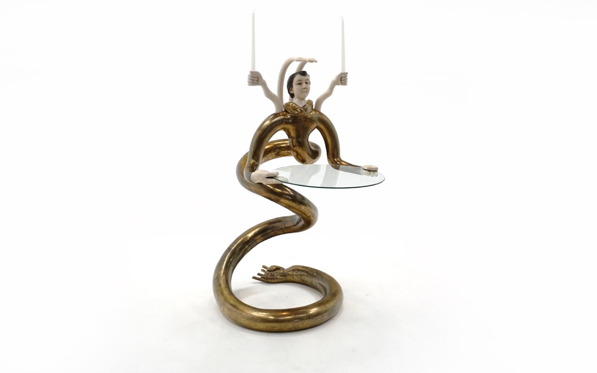 Pedro Friedeberg Snake bar, Mexico, c. 1970s. Made of carved and gilt wood, antique statuary, and glass. The stretched out hands hold the round removable glass tray and the upper hands serve as candle holders. This piece has been thoughtfully,