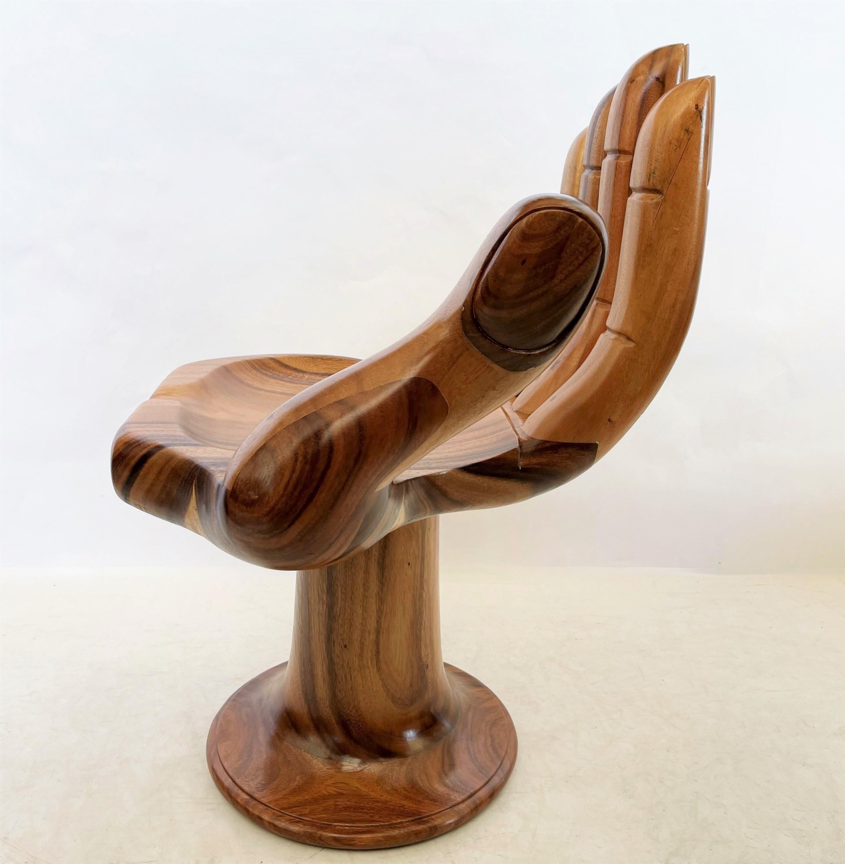 carved wooden hand chair