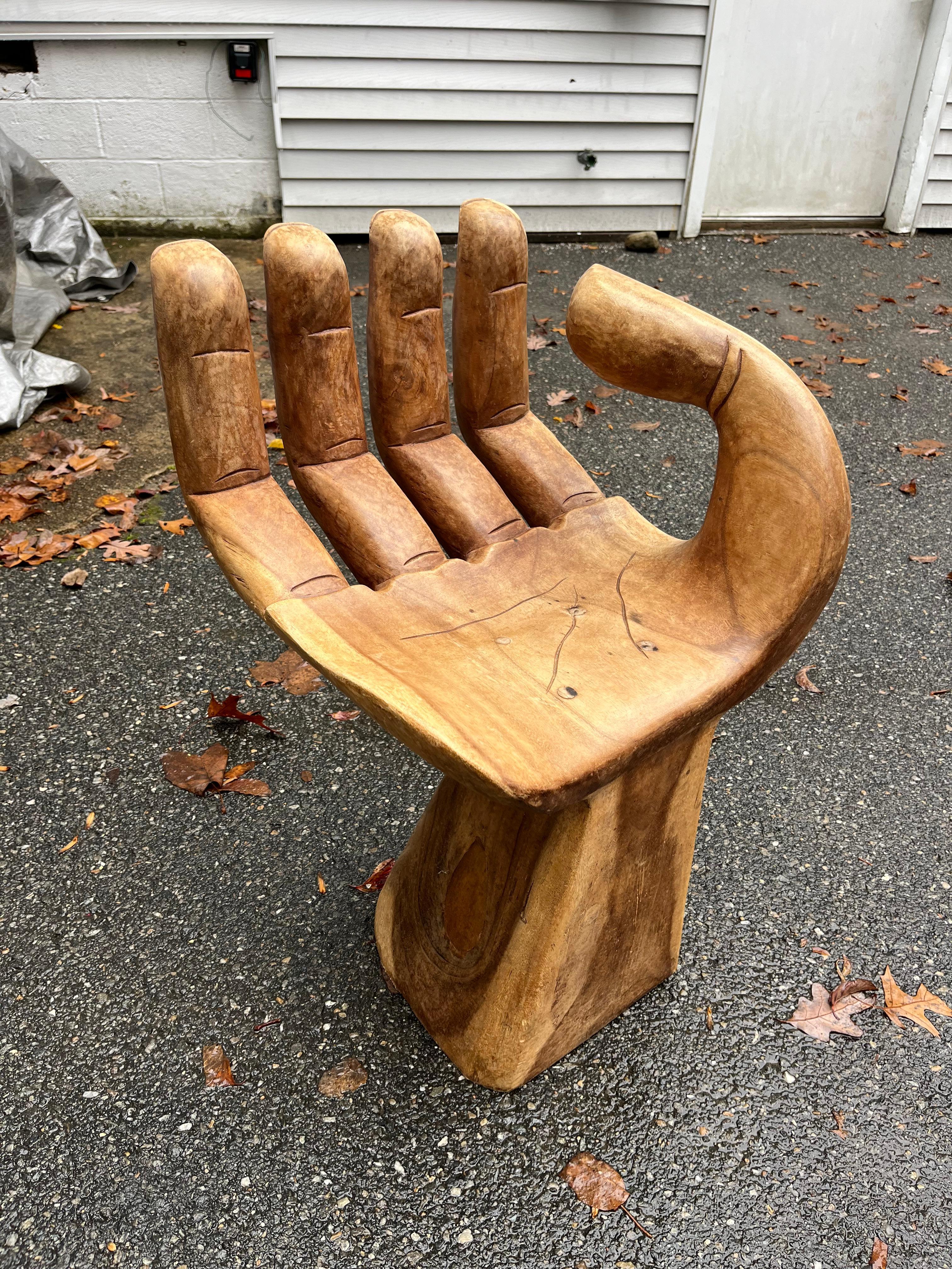 A nice early “Hand” chair circa 1970, after the artist Pedro Friedeberg, carved in walnut with a nice patina and details. Nice smaller scale - would make a cool desk chair for a kid. 