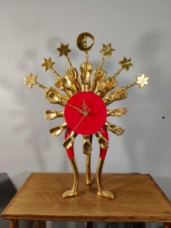 Orologio astroecologico in legno di Pedro Friedeberg, rosso con foglia d'oro