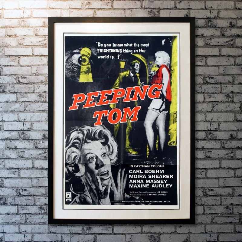 Peeping Tom, Unframed Poster, 1960

Original One Sheet (27 x 41 inches). A young man murders women, using a movie camera to film their dying expressions of terror.

Year: 1960
Nationality: United Kingdom
Condition: Folded-as-Issued
Type: