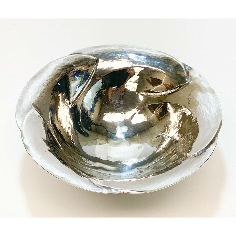 Peer Smed Danish-American sterling silver hand wrought footed bowl, circa 1935.

Hand hammered throughout with modernist rose petals. Reticulated base. Peer Smed sterling silver marks to the underside. 

Additional information:
Brand: Peer Smed