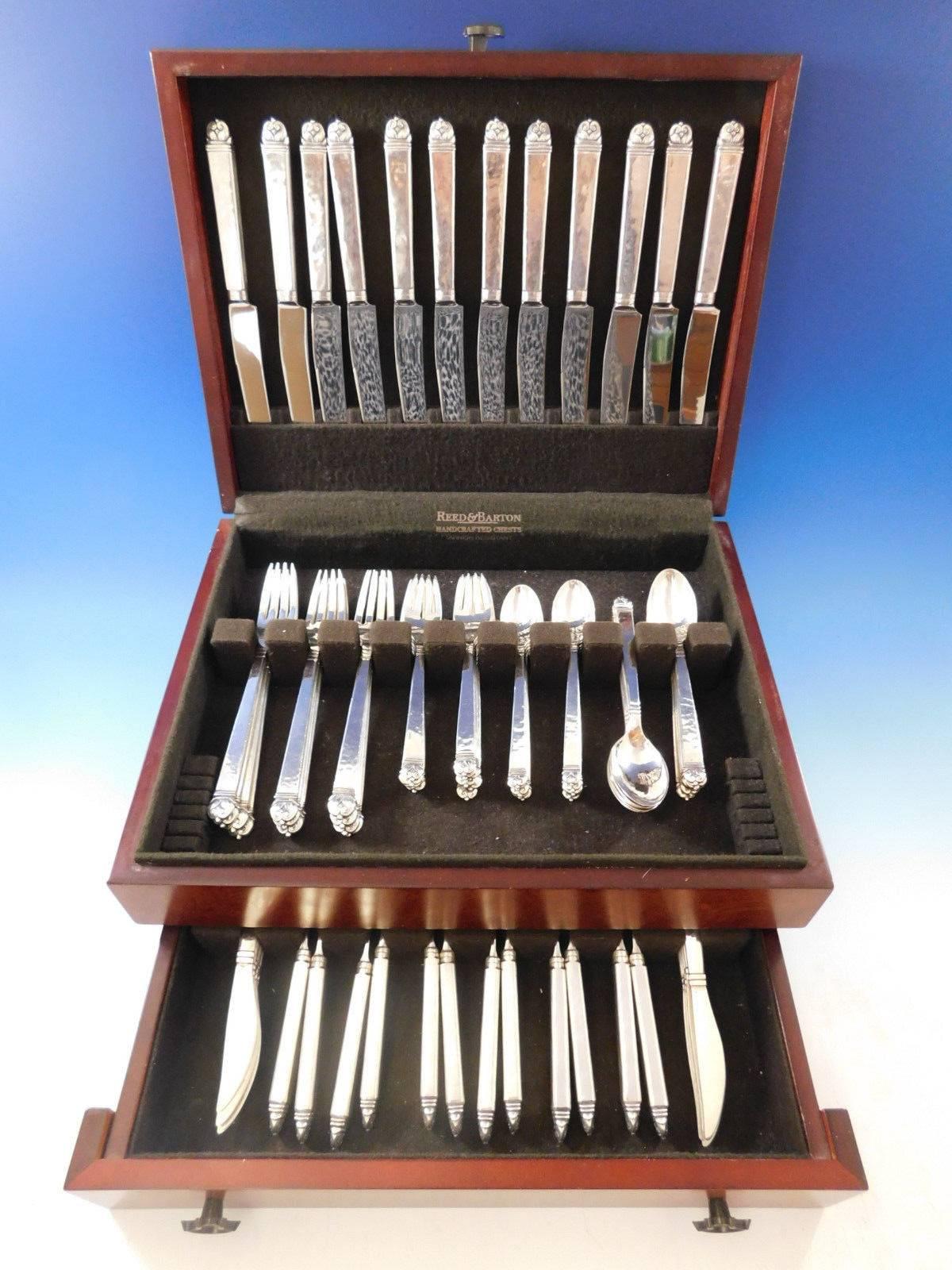 A rare and exceptional hand wrought Peer Smed Danish Sterling silver Flatware set with subtle hand hammered finish, 82 pieces. This set includes:

12 Dinner Size Knives, 9 3/4
