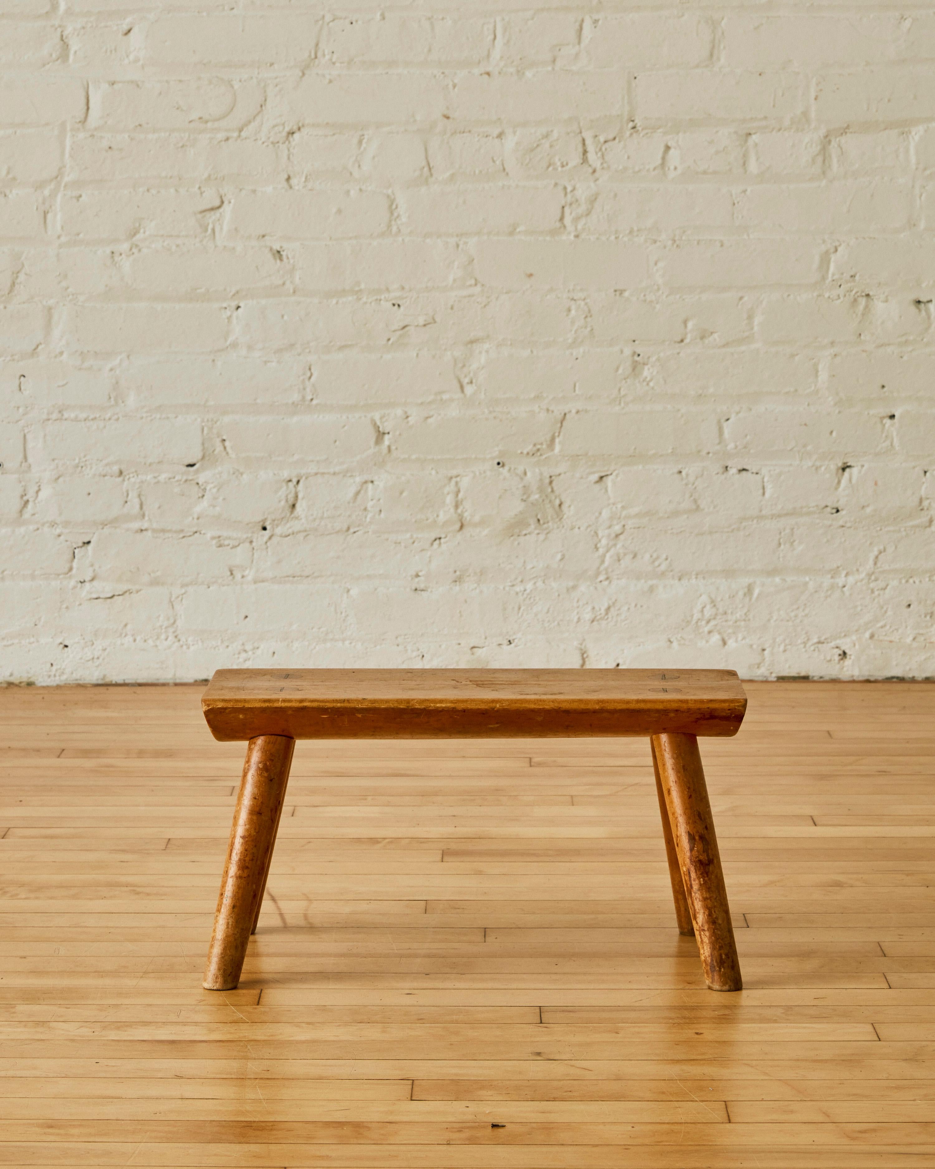 Peg Leg Milking Foot Stool with mortise and tenon splayed peg legs. 

