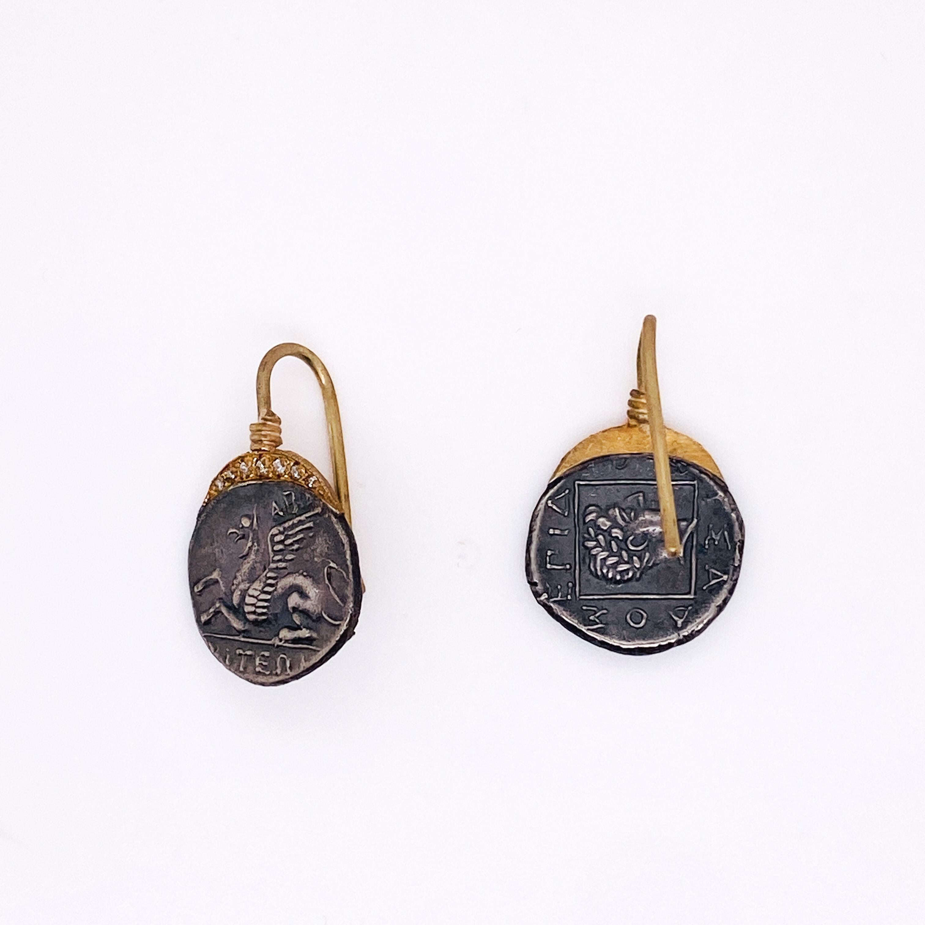 Let yourself fly away with these one-of-a-kind beautiful mixed metal Pegasus earrings. Antiqued sterling silver double sided coins feature Pegasus on the front and a face in profile on the reverse. Above the coins are a crescent of 24 karat yellow