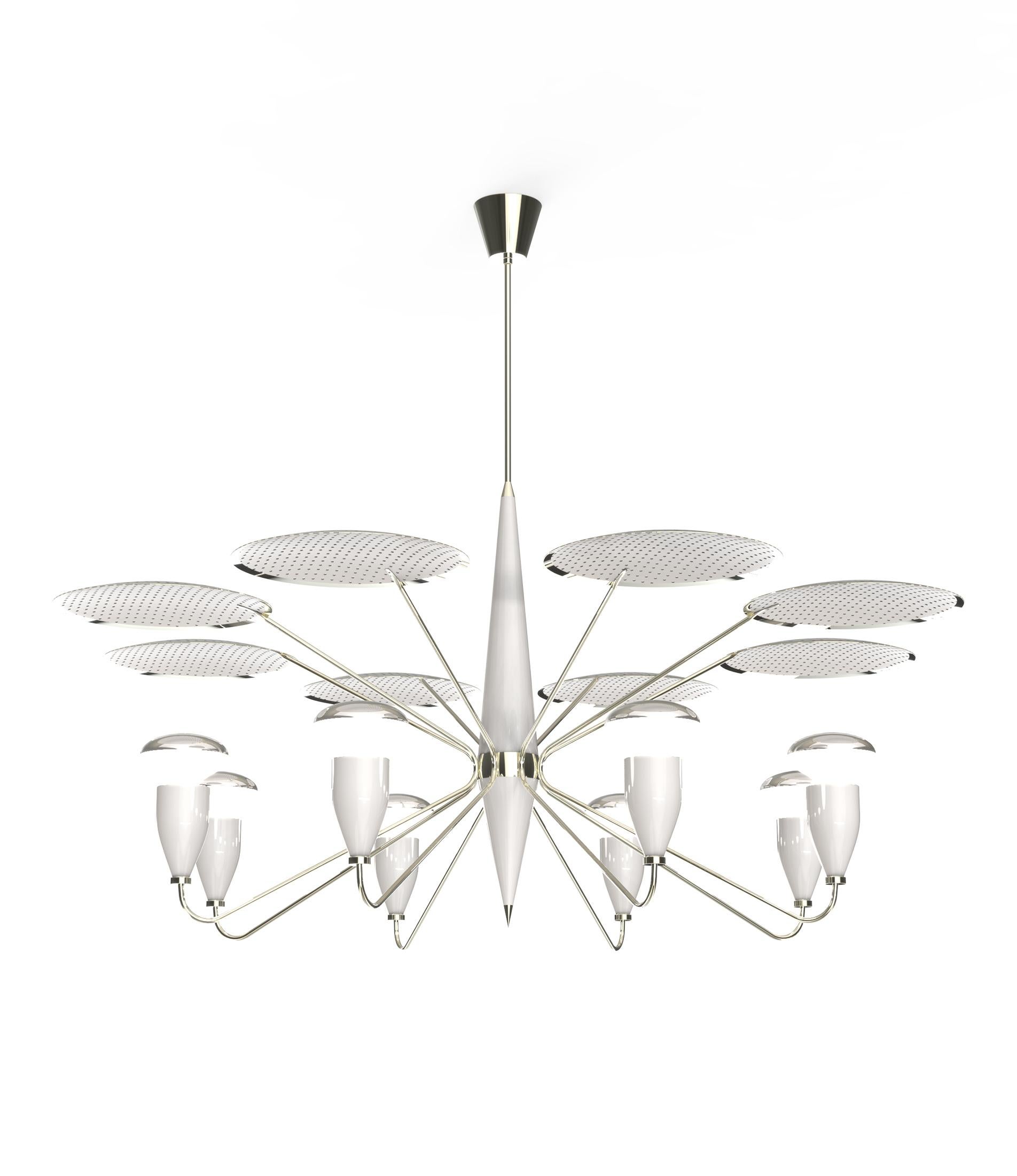 Peggy modern chandelier has a 1960s feel that won’t go unnoticed. With a structure handmade in brass and wood and with a top cover in perforated steel, this unique lamp has a nickel plated and matte white finish. The dazzling lighting design lamp
