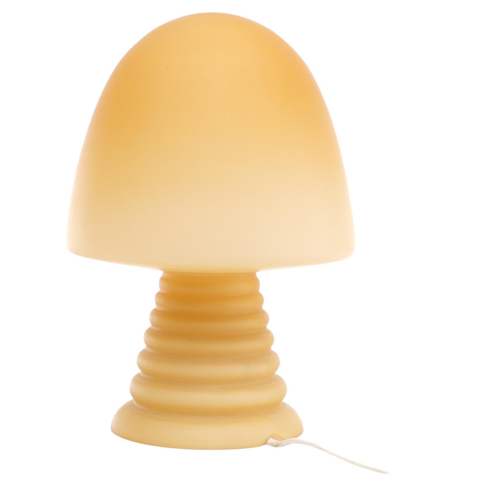 Very nice Mushroom table lamp. Made by Peill & Putzler Germany in the 1970s. 
Beautiful light Orange color. The lamp is fully made of satinated glass, 
Suited for regular small socket E14 light bulbs.