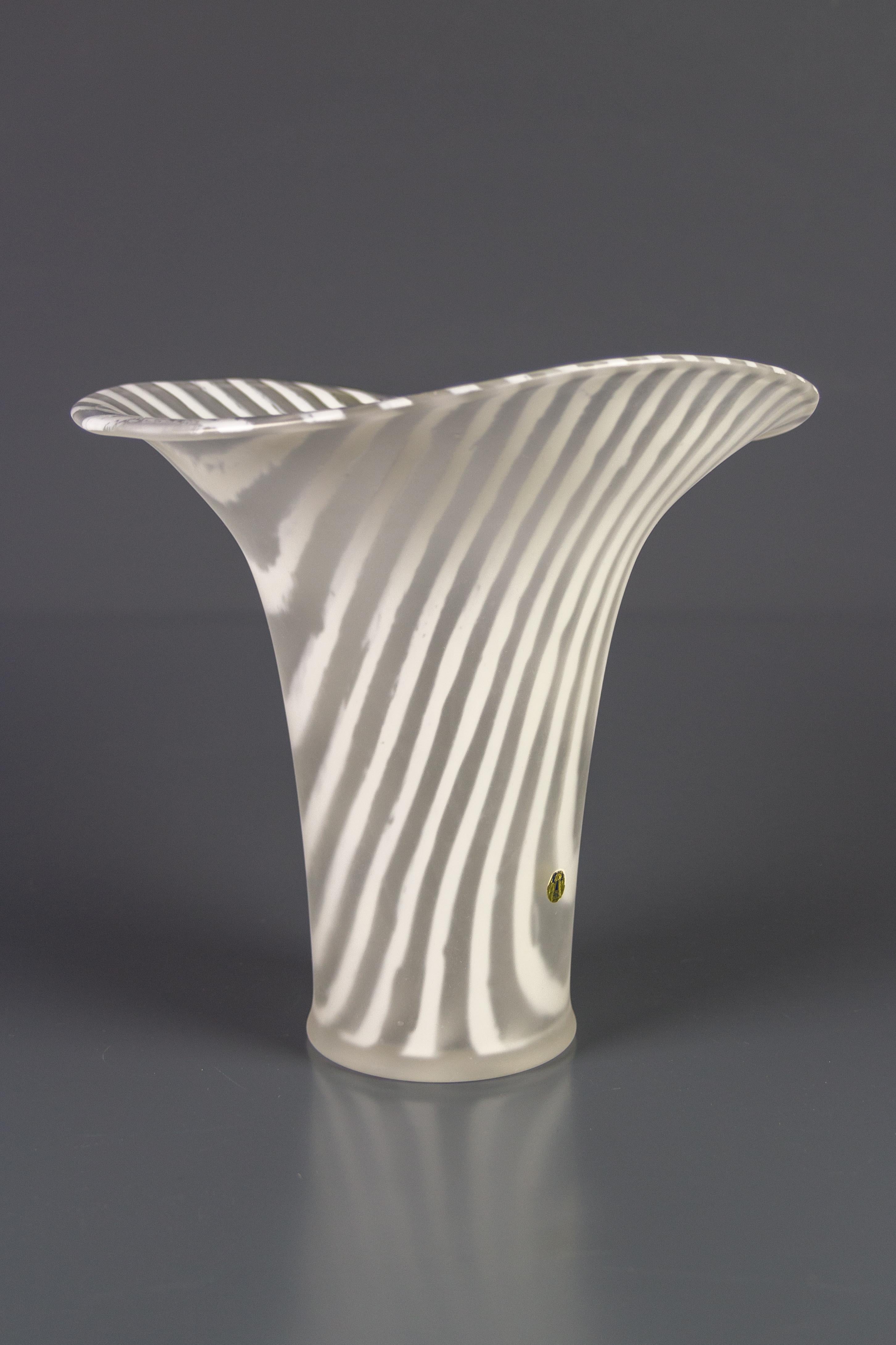 Beautifully shaped Zebra Kenya design glass vase by Peill & Putzler, Germany, 1970s. The finely frosted outside finish is beautifully contrasted by the glossy glass of the inside surface.
Dimensions: height: 26 cm / 10.23 in; diameter: 28 cm /