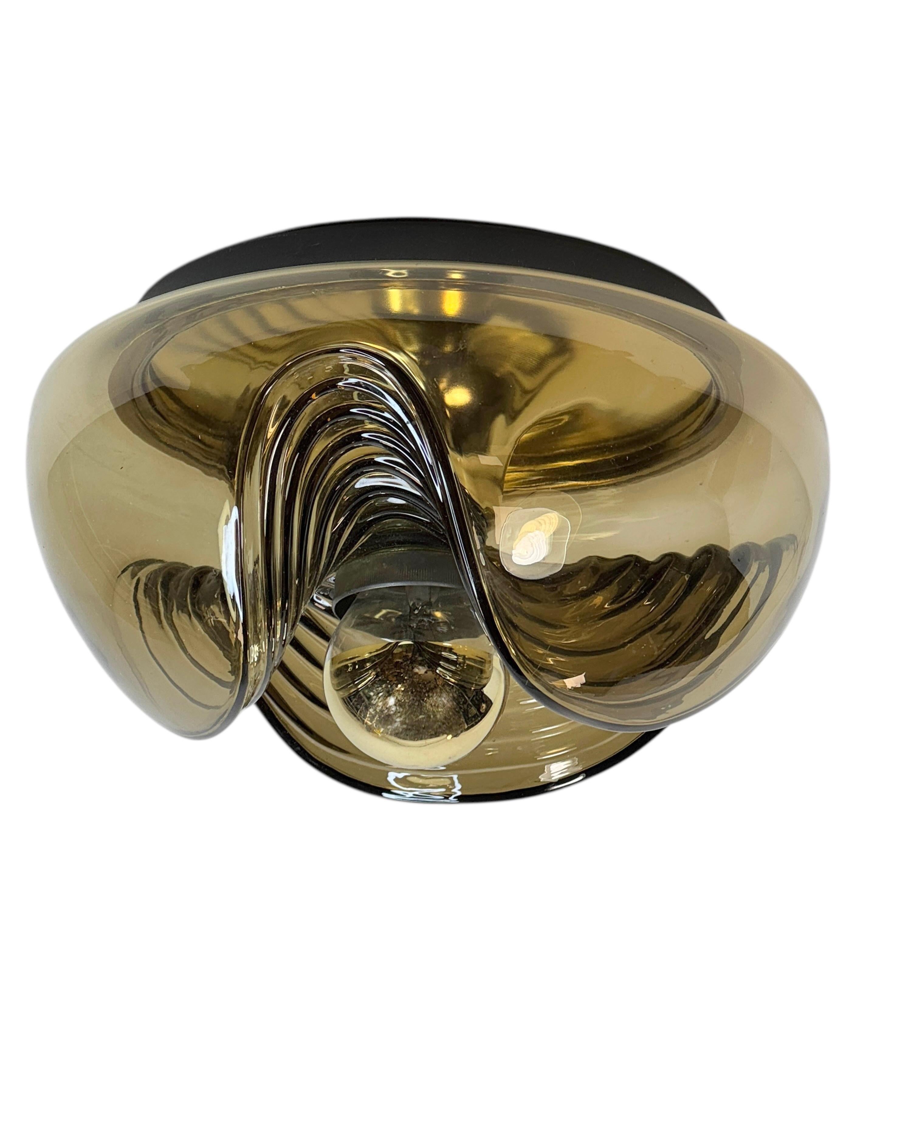 Peill & Putzler Amber Glass Wave Flush Mount or Wall Light by Koch & Lowy, Germany, 1970s

A beautiful amber glass “wave” flush mount or wall sconce designed by Koch & Lowy for Peill & Putzler, Germany, circa 1970s. The design features a richly