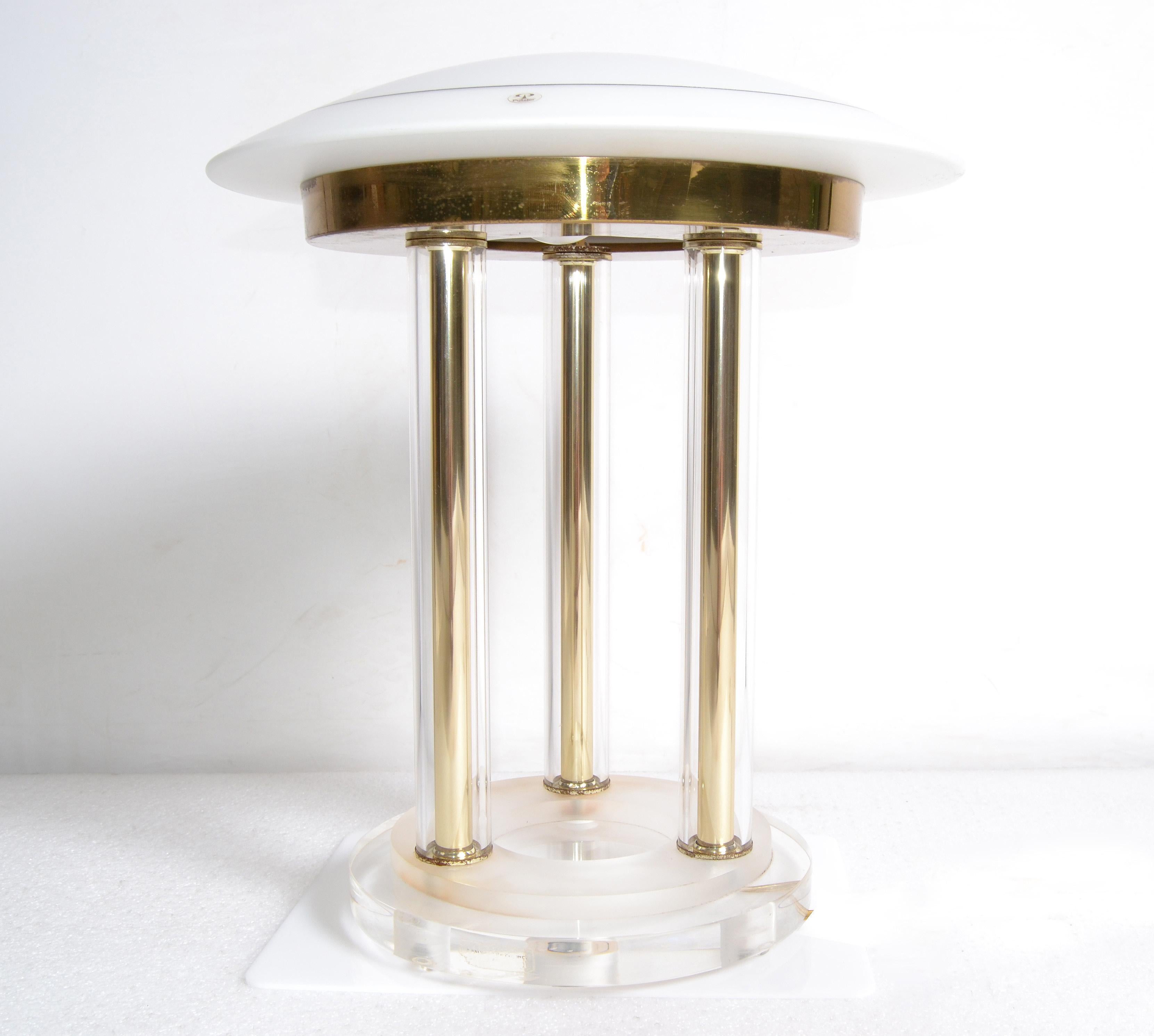 Mid-Century Modern Space Age brass, Lucite and blown glass table lamp made by
Peill & Putzler in Germany.
Has the original porcelain socket and takes one regular light bulb with max 75 watts.
Makers Mark at the glass globe and Lucite base.
 