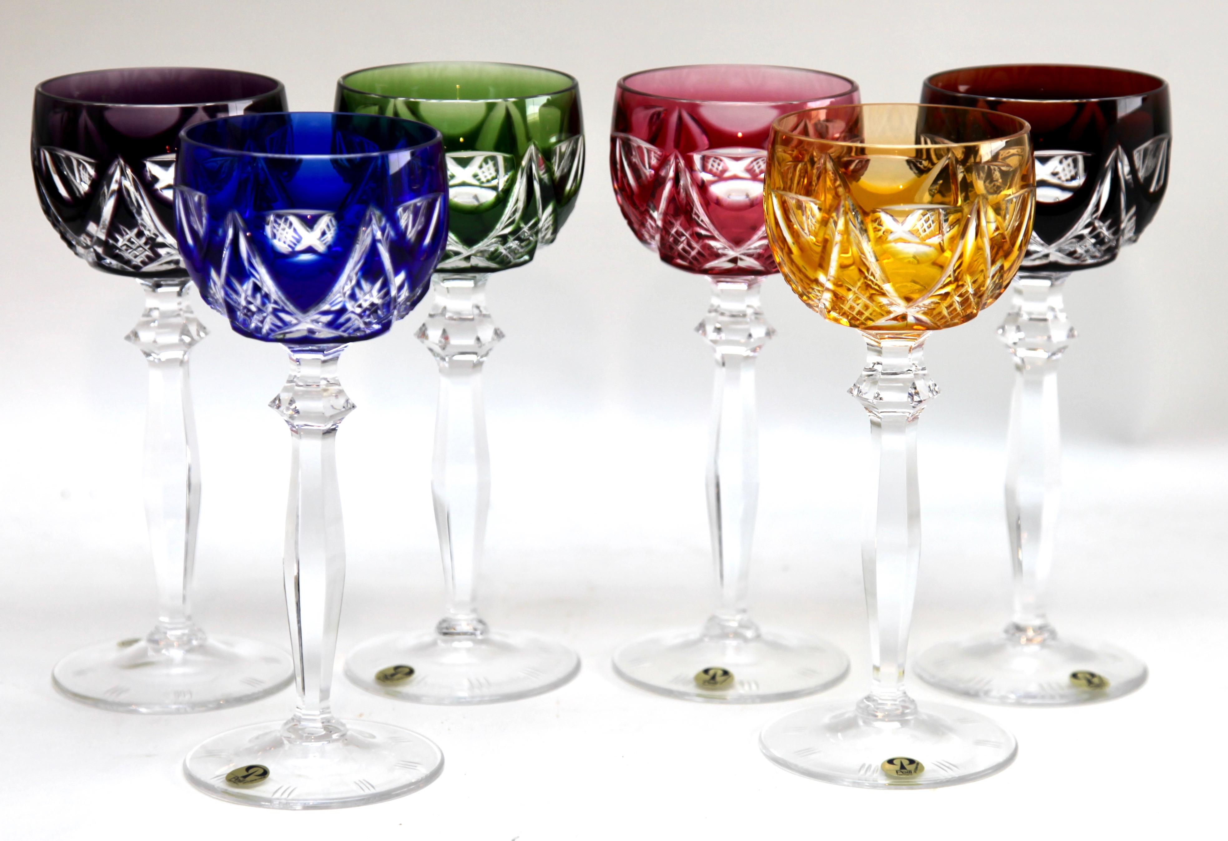 Vintage Peill & Putzler set of 6 cut to clear crystal stem glasses.
Crystal (Bleikristall 24% Mundgeblasen Handgeschliffen) glasses

Clear demi crystal glass. Side facetted and toothed stem. The bowl with colored overlay cut to clear. 
In best