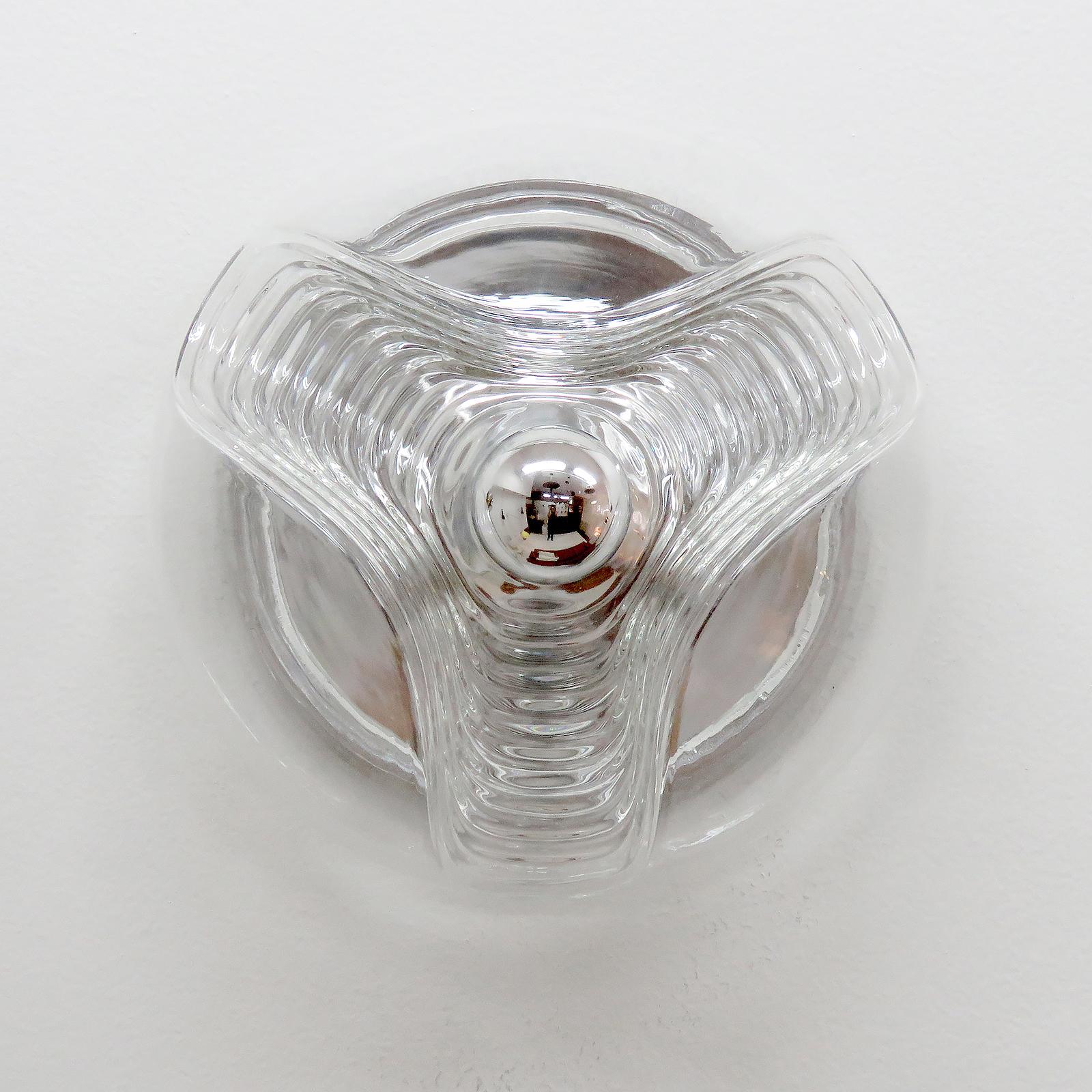 Timeless, molded clear glass flush mount light 'Futura' by Peill & Putzler Germany, wall or ceiling mounted, wired for US standards, one E27 socket per fixture, max. wattage 75w or LED equivalent, silver-tip bulbs provided as a onetime