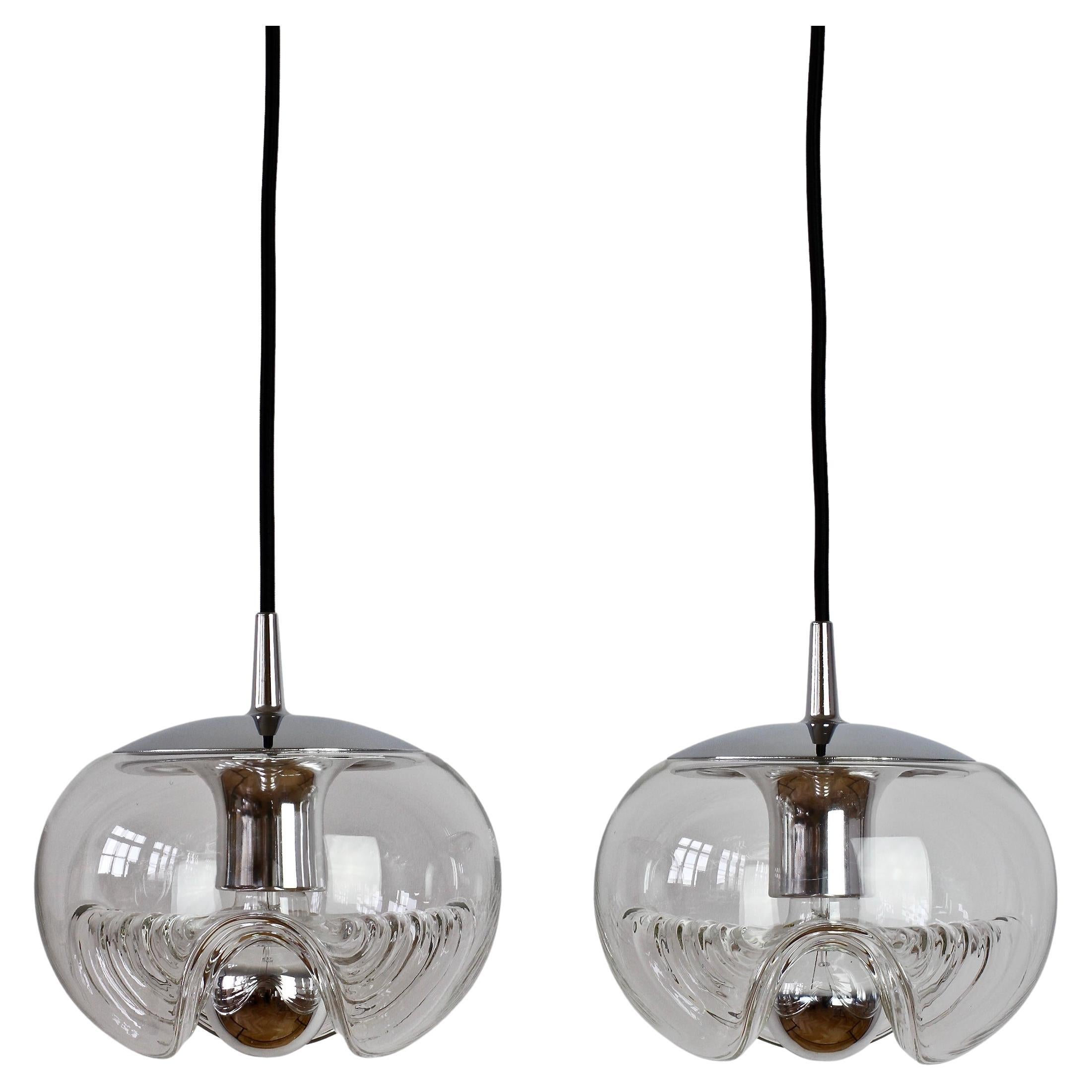 Peill 
Putzler Pair of Biomorphic 
Futura
 Clear Glass Pendant Lights, 1970s