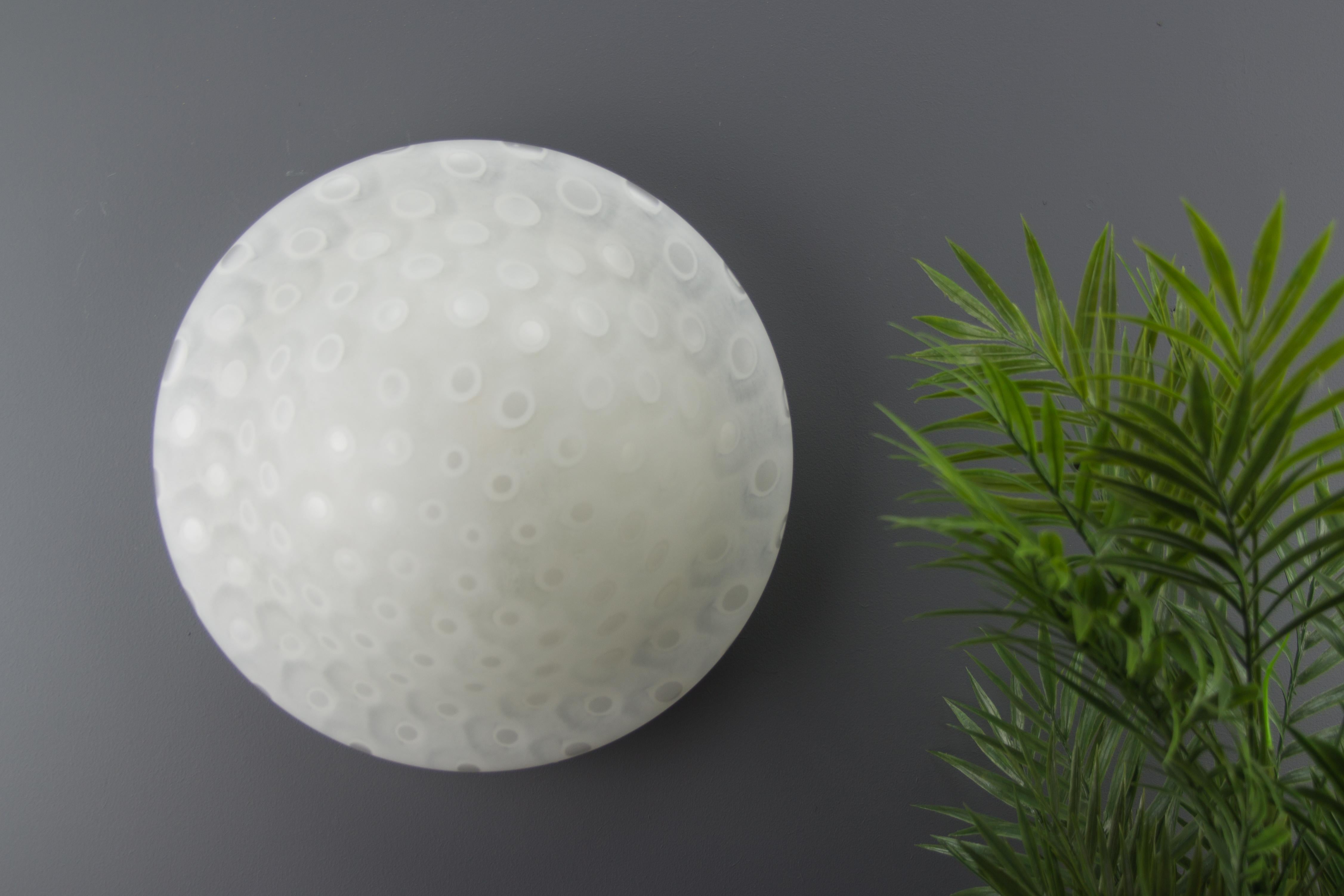 Peill & Putzler white frosted glass flush mount ceiling or wall light, the 1970s
A beautiful white frosted glass flush mount ceiling light or wall light in a shape of a mushroom with a decorative dotted pattern. Made in Germany by Peill & Putzler in