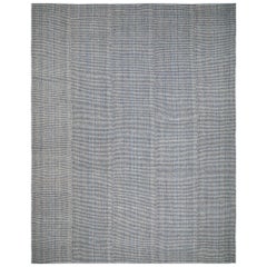 Pelas Handwoven Flatweave Textured Pattern Rug in Blue and Beige Color