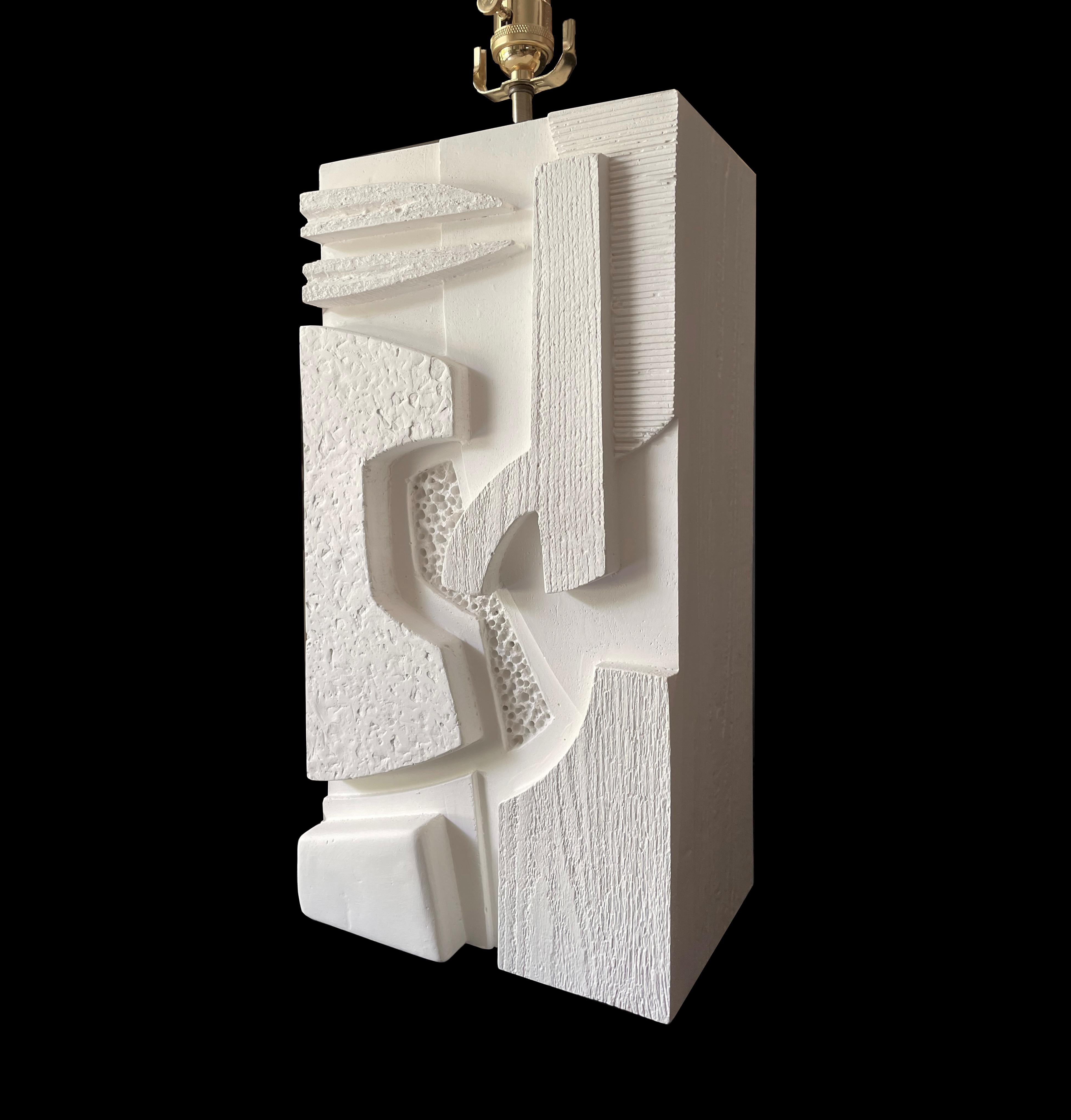Pêle-Mêle Complementary Table Lamp 1 by Daniel Schneiger
One of a Kind.
Dimensions: D 15,3 x W 23 x H 45,8 cm.
Materials: Cast from gypsum plaster.

This lamp is part of a complementary pair inspired by the collages of Matisse, hence the name,