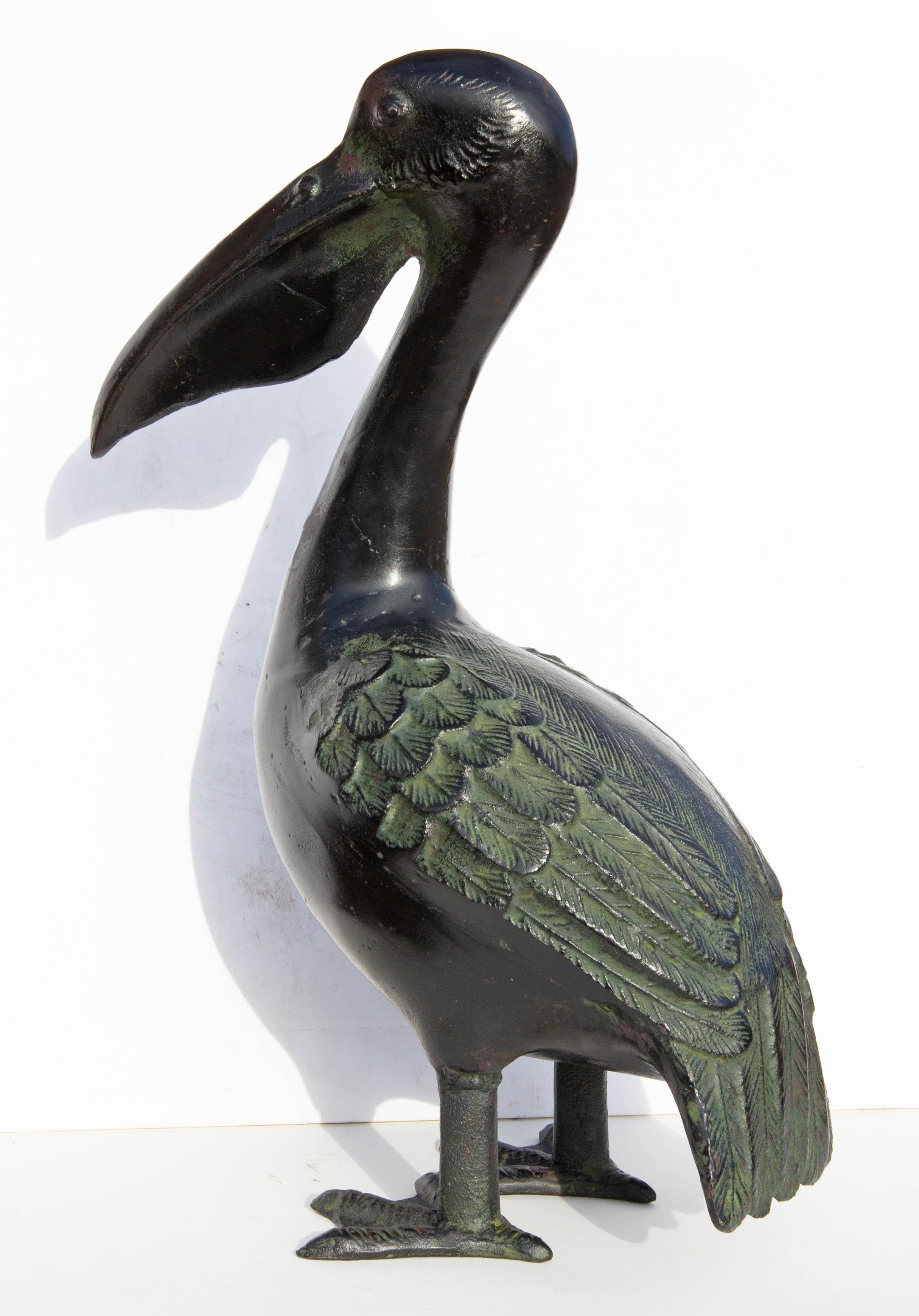 Cast iron pelican sculpture. Japanese, mid-20th century. Stamped 