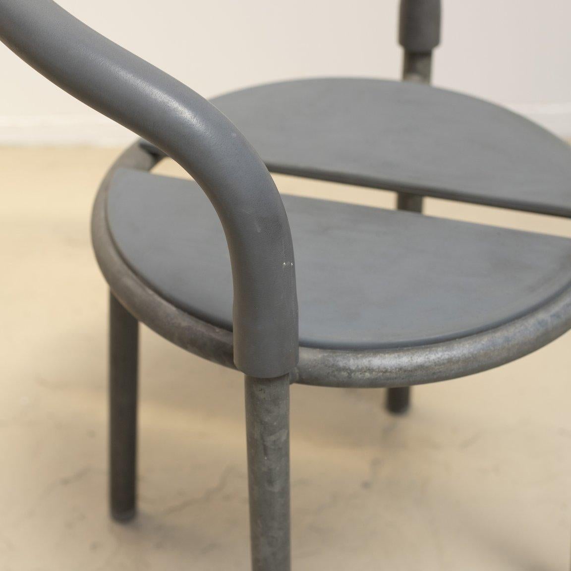 1991 / Denmark
Size: W 510, D 500, H 700, SH 430 mm

Pelikan Cafe chair in vintage condition. Designed by Niels Gammelgaard & Lars Mathiesen in 1983, Manufactured by Fritz Hansen. Made out of galvanized iron and rubber. Weight 7.5kg for per