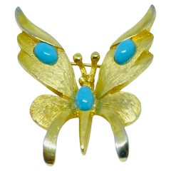 PELL vintage signed gold tone faux turquoise butterfly designer brooch